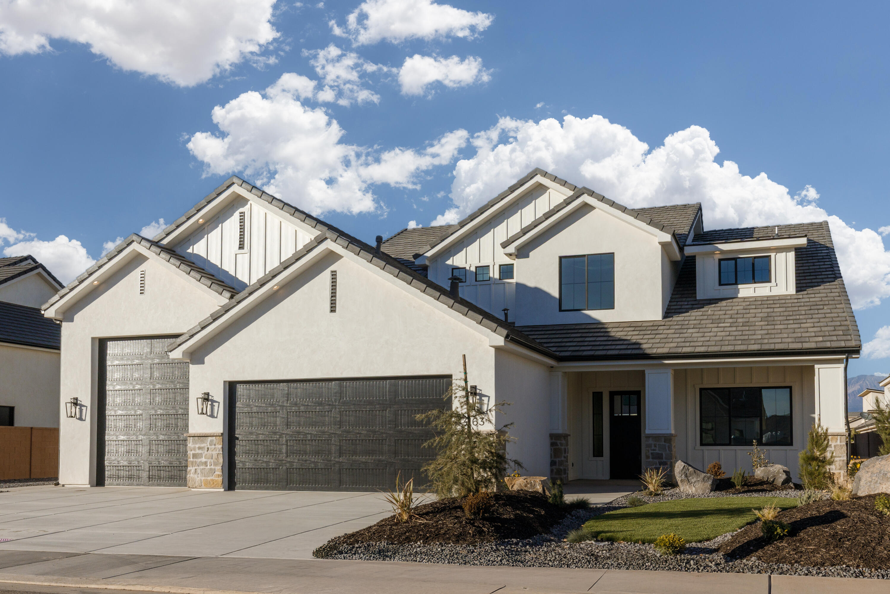 MOVE IN READY!  Brand new, stunning home with an RV Garage and RV Parking! Built by B1 Builders. Detailed interior with beautiful finishes. Lots of storage, butler's pantry and 2 laundry rooms. Guest bedroom on main level with on suite bathroom - could also be used as a second Primary Bedroom. RV Garage measurements - about 30' deep, 15' wide with a 10'x12' garage door.  Full landscape and block walls on three sides included.  Gates have been ordered.