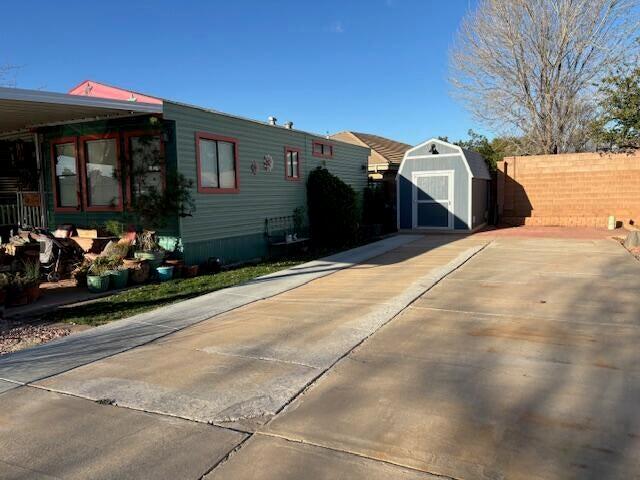 This RV lot is located at the back of the community and close access to second clubhouse making it one of the best RV lots in Washington County!  Nice shed, paver patio, and rear block wall. This park is a 55+ community. RV must be no more than 10 years old and can not weigh more than 25,000 lbs. Low HOA fee of $105 provides pool, two clubhouses, pet park area, sewer, garbage, and water. Close to all amenities, just off Sunset Blvd. Great opportunity for owner use or investment. Lot may be rented long term.