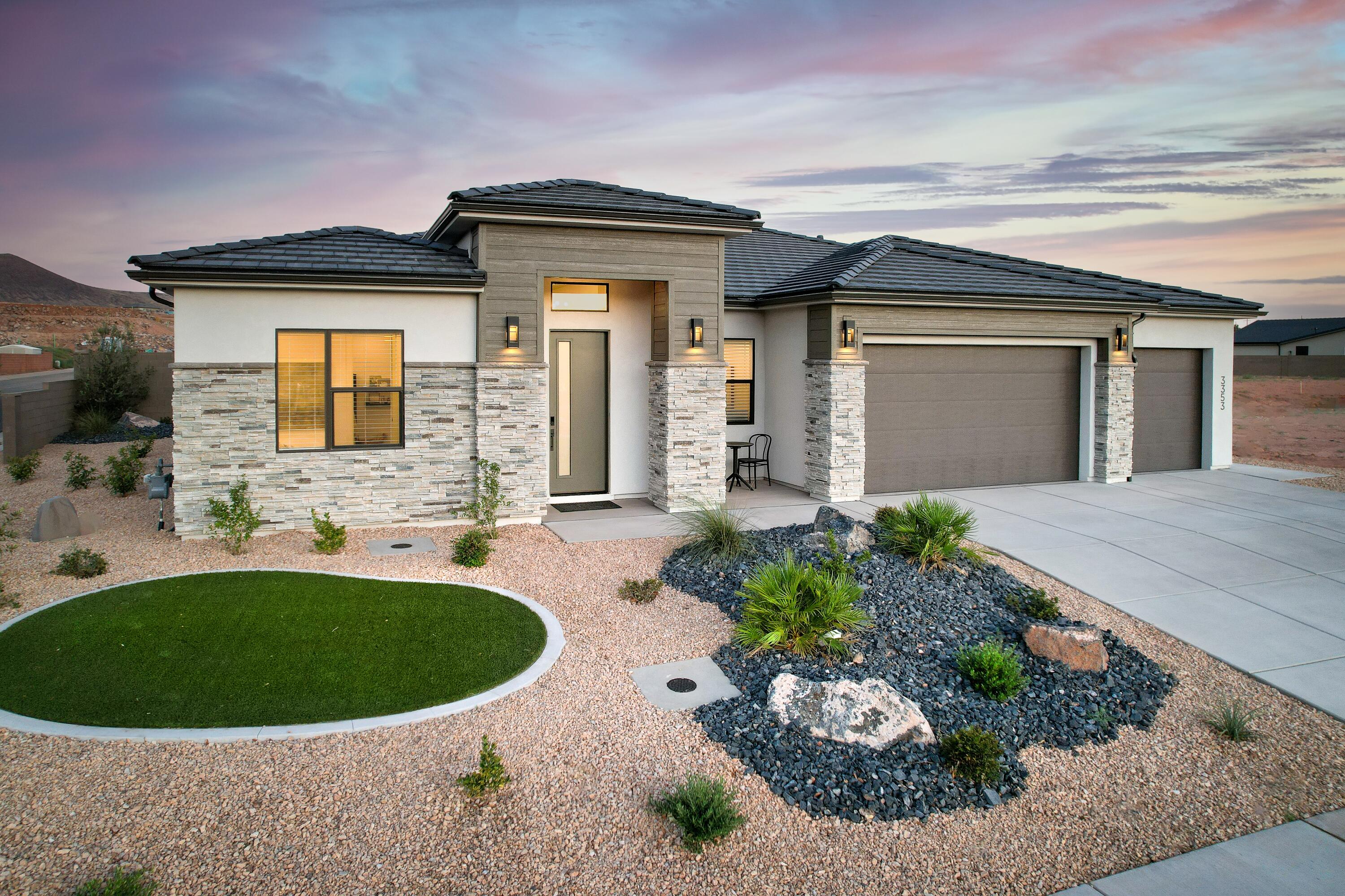 Experience one of the most upgraded homes Rose Bradley Homes has to offer. This brand-new Gemini floor plan features 4 bedrooms, 2.5 baths, a 3-car garage, and 2,243 square feet of thoughtfully designed living space with premium finishes throughout.

The gourmet kitchen is appointed with quartz countertops, stainless steel appliances, a vented hood, porcelain farmhouse sink, oversized island, and an expansive pantry. The open great room features a 12-foot sliding glass door, custom fireplace with built-in cabinetry, and abundant natural light. The primary suite includes a Euro glass walk-in shower, dual vanities, and designer finishes, while upgraded flooring, framed mirrors, gold lighting fixtures, a mudroom, and spacious laundry room add both style and function.

Outside, enjoy professionally landscaped xeriscaping and a private, low-maintenance backyard that's perfect for relaxing without the upkeep of a large yard.

Located with no HOA, you'll be just minutes from Grandpa's Pond, Sky Mountain Golf Course, Sand Hollow State Park, hiking, biking, and everything Hurricane has to offer.