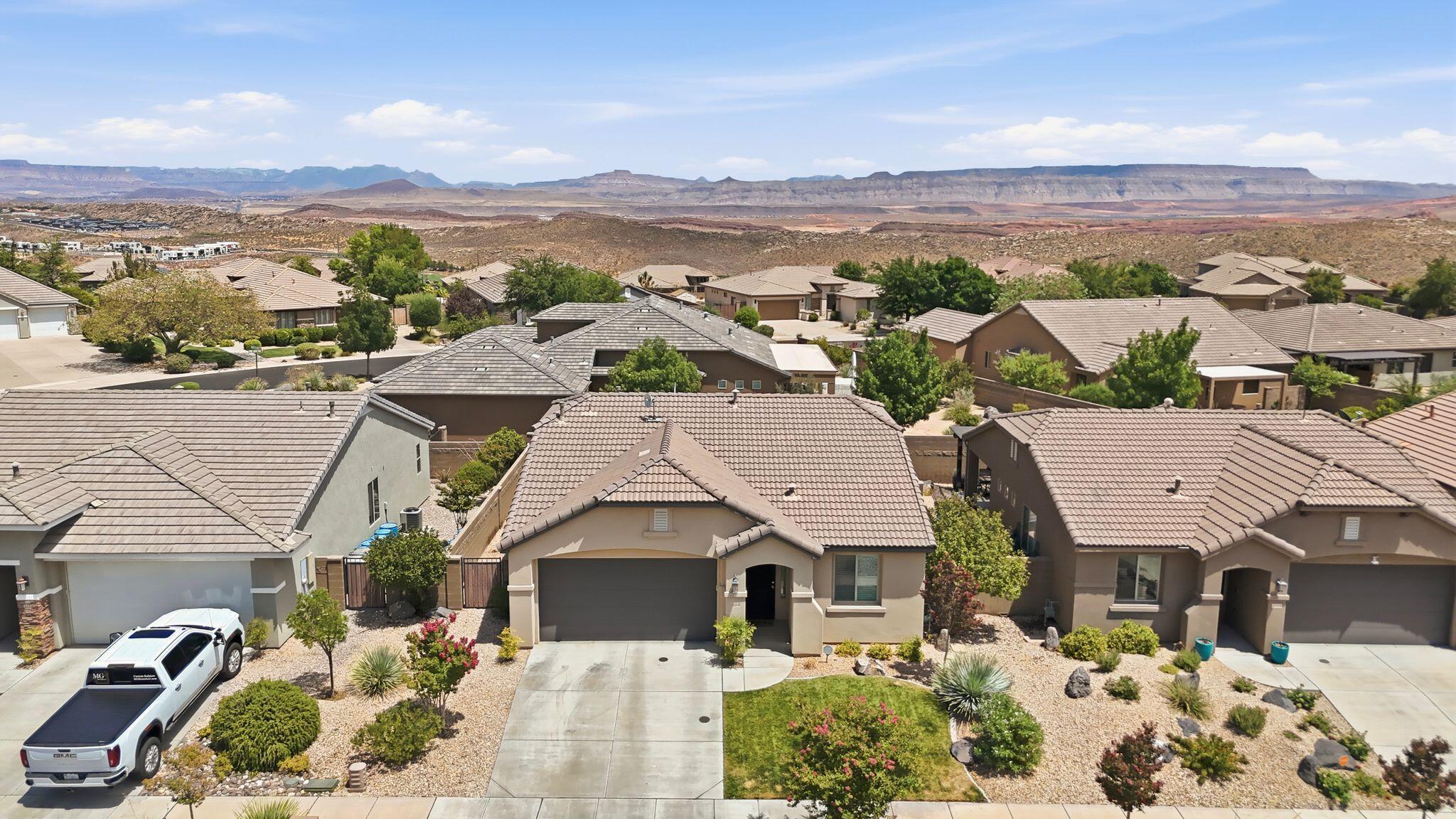 Beautifully maintained home located in the desirable Highland Park neighborhood of Coral Canyon. Built in 2016, this 1,168 sq. ft. residence sits on a 0.08-acre lot and features 3 bedrooms, 2 bathrooms, and an inviting open-concept floor plan designed for comfortable living and entertaining, 2 car garage with epoxy flooring and custom garage storage. The pride of ownership is evident throughout, with luxury vinyl plank (LVP) flooring, granite countertops, quality GE appliances, water softener, and an elegant electric fireplace. Step outside to a fully fenced backyard featuring low-maintenance turf landscaping and a covered patio, perfect for relaxing or hosting guests. Residents also enjoy access to outstanding community amenities, including indoor and outdoor swimming pools, an indoor hot tub, tennis and pickleball courts, a fitness room, playgrounds, and a park. Conveniently located just minutes from Coral Canyon Golf Course, this exceptional home offers the perfect blend of comfort, style, and location. This is a must-see property that is sure to attract attention--don't miss your opportunity!