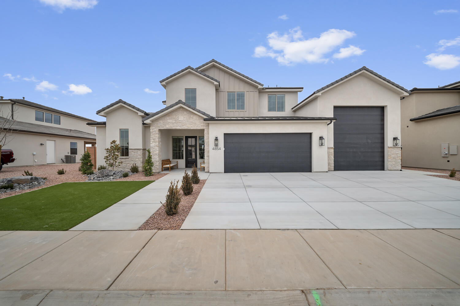 Thoughtfully crafted for comfort, connection, and adventure, The Trailway by Canyon Mill Homes delivers a lifestyle as inspiring as its surroundings. This 2,688 sq. ft. residence showcases a highly livable and intuitive floorplan, highlighted by the expansive indoor/outdoor entertaining spaces that seamlessly blend the heart of the home with the natural beauty of Southern Utah. Large windows and the 8'x8' slider offers great views of the surrounding Sand Hollow area, making every room feel connected to Southern Utah's spectacular landscape.
A defining feature of The Trailway is its oversized 765 sq. ft. RV garage--perfect for storing recreational vehicles, boats, or adventure gear with ease. Whether you're gearing up for a weekend on the trails or coming home from a day on the lake, this garage is built for the active lifestyle.
Situated within the Desert Sands master-planned community, this home offers unmatched access to outdoor recreation. Miles of OHV and mountain biking trail systems begin just moments from your front door. Sand Hollow Reservoir--ideal for boating, fishing, paddleboarding, and beachside relaxation--is only minutes away. Golf enthusiasts will also appreciate the quick access to Sand Hollow Golf Course, regarded as one of Utah's premier golf destinations with its stunning red rock vistas and world-class play.
The Trailway is more than a home--it's a launching point for adventure, a retreat for relaxation, and a showcase of Canyon Mill Homes' dedication to thoughtful design and elevated living.
**Photos of the home are of our last years Parade Home.  Colors and finishes vary.  There are features of this home that are not offered in our current home.  Pictures are intended to assist with the home's layout.  Contact the builder's agent for more information**
Estimated completion is the end of October.