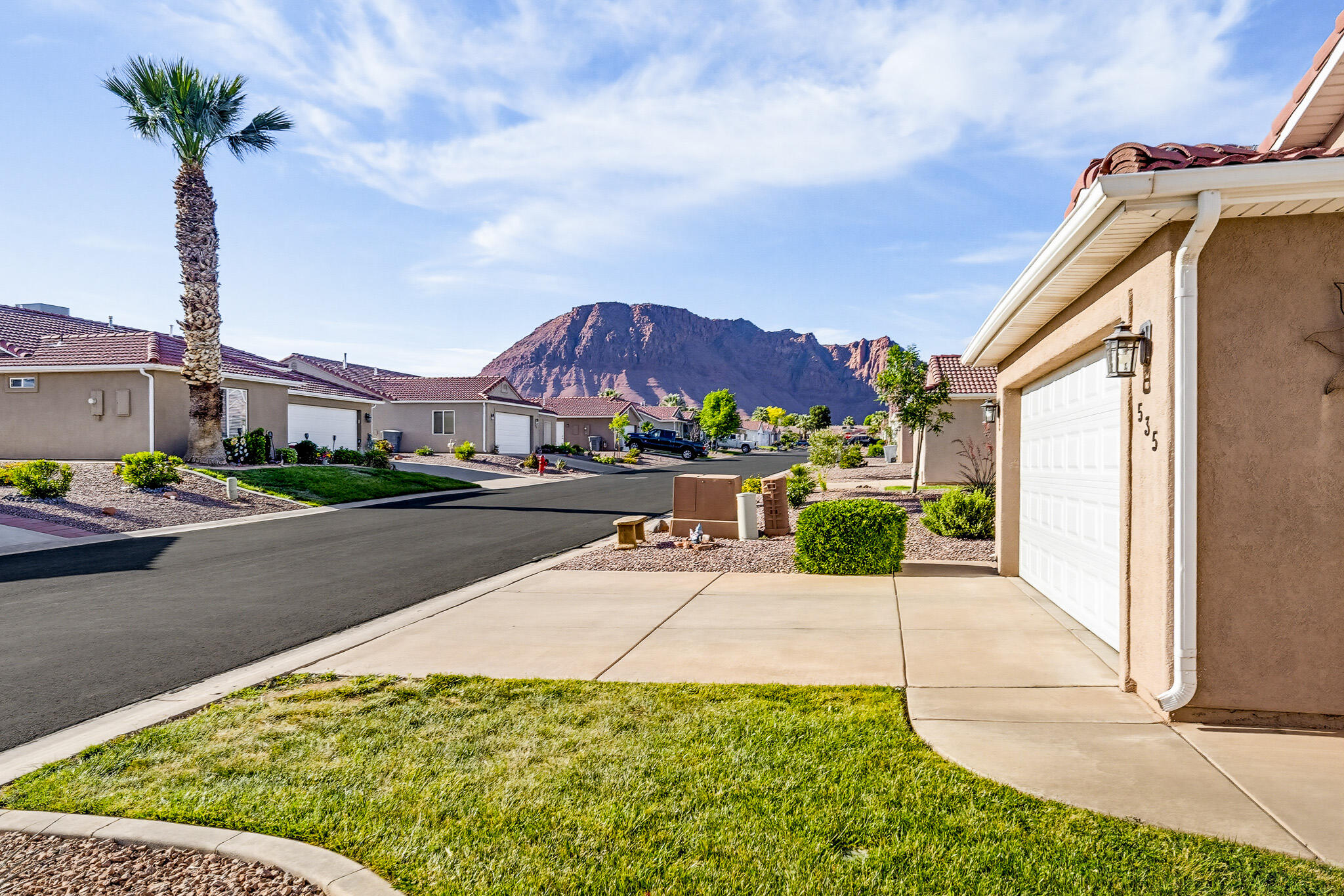 Well-maintained home in the sought-after Padre Lakes community in Ivins! This 1,477 sq ft, 3 bed, 2 bath home offers an open layout with vaulted ceilings and great natural light. The kitchen features upgraded countertops, ample cabinetry, and a large breakfast bar, perfect for everyday living and entertaining.
The spacious primary suite provides a comfortable retreat, while plantation shutters throughout add charm and efficiency. Enjoy low-maintenance desert landscaping, a welcoming back patio, and a 2-car garage. Located in a quiet, well-kept neighborhood with walking paths and water features, just minutes from Snow Canyon, Tuacahn, and scenic red rock views. Clean, move-in ready, and easy to love.