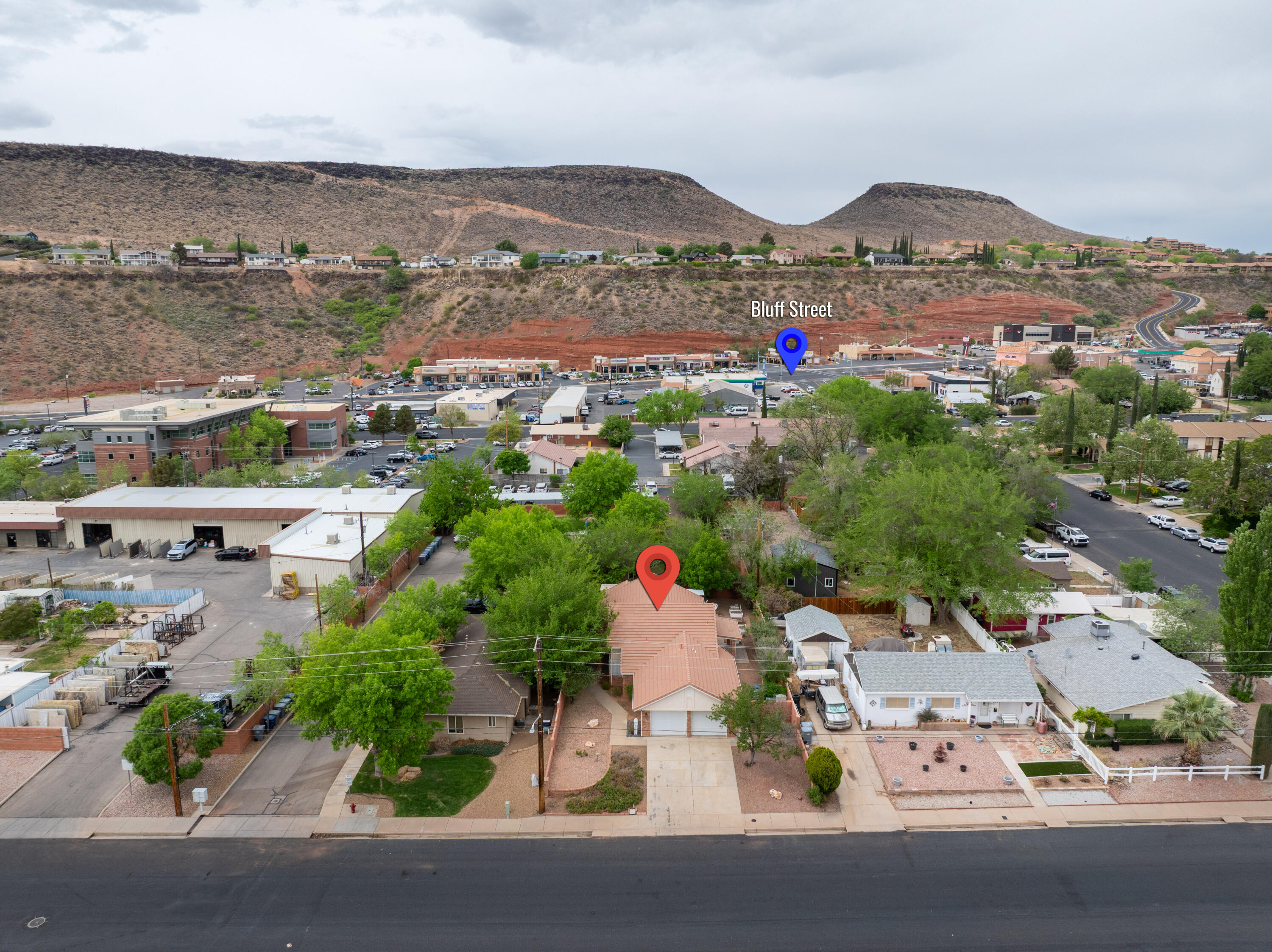 This perfect property is ideally situated in the heart of beautiful St. George, Utah, offering the ultimate combination of convenience, comfort, and charm. Located just a short walk or quick drive from an array of fabulous shopping, dining, art galleries, parks, and vibrant community events, you'll enjoy easy access to everything that makes this area so desirable. Whether you're exploring local boutiques, enjoying nearby restaurants, or taking advantage of outdoor recreation, this central location truly has it all. Tucked away for added privacy, the home is nicely secluded with mature trees and a peaceful, private yard creating a serene retreat right in the middle of town. Inside, you'll find a thoughtfully updated interior featuring brand new carpet, beautiful hardwood flooring throughout, and a stylishly renovated kitchen and bathrooms that blend modern finishes with timeless appeal. The layout is both functional and inviting, making it perfect for everyday living as well as entertaining. This home has been meticulously maintained and is truly move-in ready, offering a seamless transition for its next owner. Whether you're searching for a full-time residence, a second home, or an investment opportunity, this property checks all the boxes. Come experience this charming gem for yourself. Vacant and easy to show!