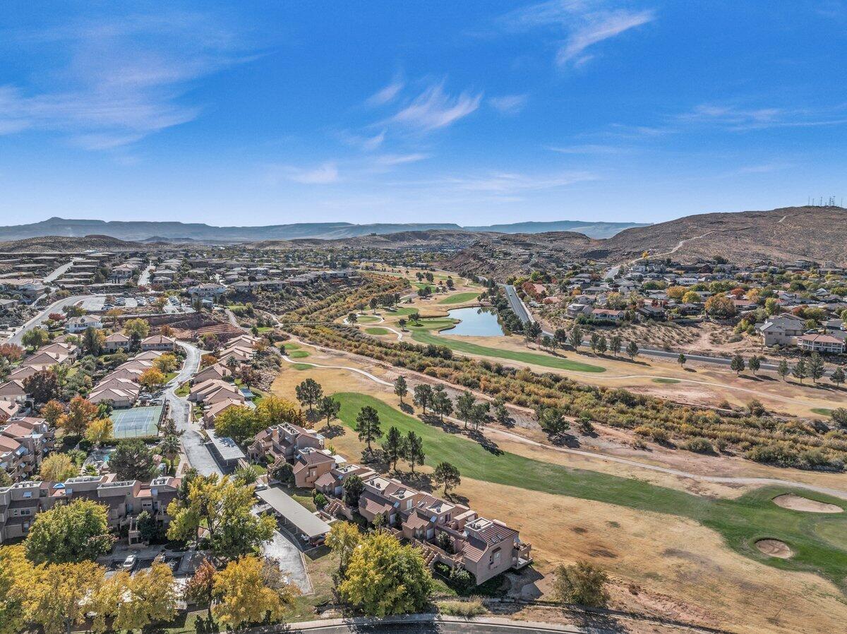 This newly updated ground-level condo at St. George Golf Club offers the perfect blend of comfort, style, and convenience! Enjoy serene golf course and mountain views right from your private patio, creating a peaceful setting for relaxing mornings and evenings. The prime location puts you close to shopping, dining, and outdoor recreation, making it easy to enjoy all that St. George has to offer. Inside, the bright and inviting layout features 2 spacious bedrooms, 2 bathrooms, and abundant natural light throughout. Residents of the Tamarack Condo Association enjoy fantastic amenities including a pool, hot tub, pickleball courts, and so much more! Buyer to verify all information, deemed reliable, however buyer to verify all info including utilities, rental restrictions, and HOA information if applicable. if applicable.