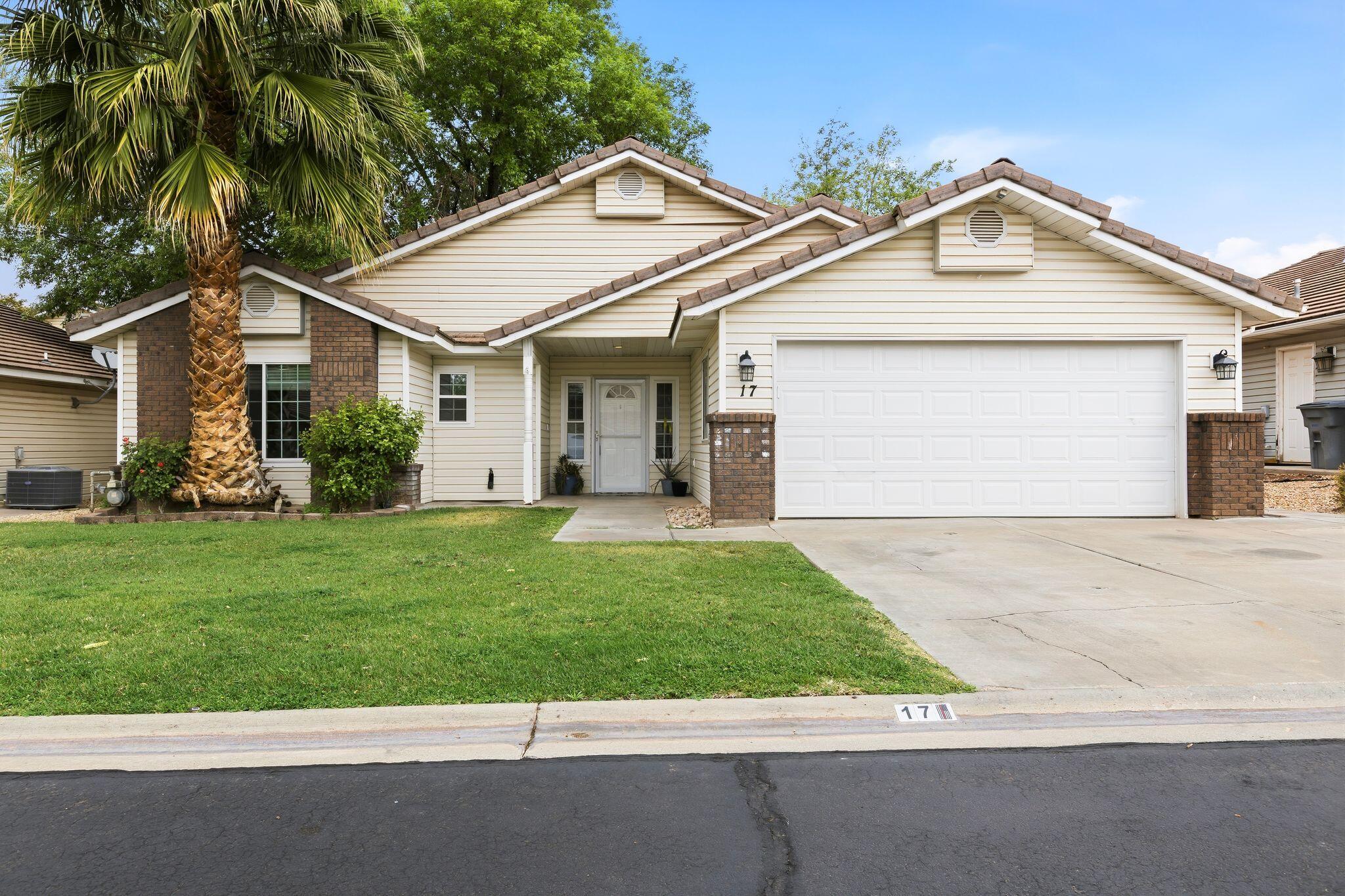 Charming 3 bed 2 bath 2 car detached single story in the heart of Dixie priced under $400K! Attractive features of this cozy home include vaulted ceilings in living / dining great room, wood plank flooring & ceiling fans throughout, entertainment center with shelving, granite countertops in kitchen and baths, mature landscaped front yard with porch, and shaded private backyard with turf & dog run. Kitchen features granite countertops, pantry and breakfast bar. Entire house recently outfitted with energy efficient windows$$ and water heater replaced.  The community of Stone Pointe Patio Homes sits just minutes away from the beautiful Shadow Mountain Park and its central location to all of STG amenities can't be beat! Icing on the cake.... HOA fees cover all water, sewer, and landscaping expenses!!