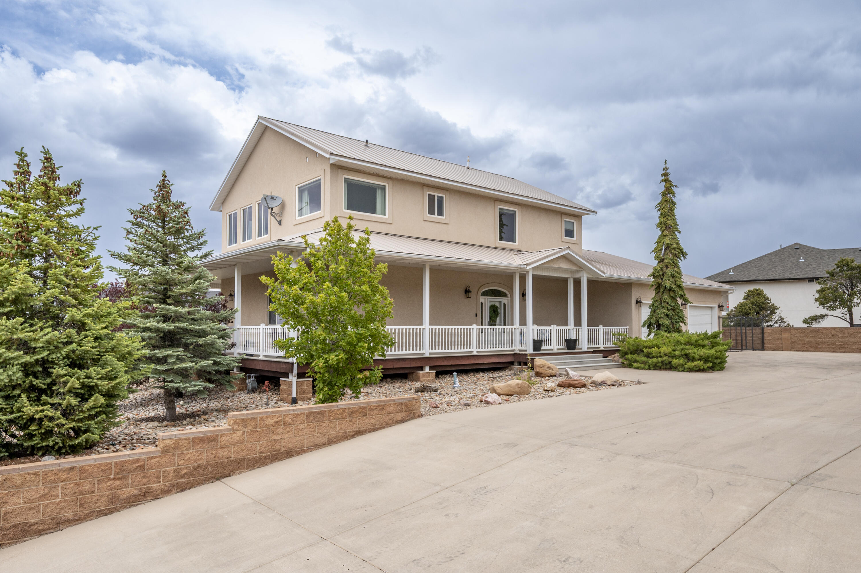 Stunning home overlooking the Cedar City Temple, beautifully xeriscaped for low-maintenance living and abundant parking for RVs and all your toys. This spacious 4-bedroom, 4-bath home also offers two additional flex spaces perfect for a home office, gym, hobby room, or playroom. Three of the four bedrooms feature private ensuite bathrooms, providing exceptional comfort and privacy for family and guests alike. Designed to impress, this home features a wraparound deck and countless upgrades, including a newer $13K Sub-Zero refrigerator, A/C unit, furnace, flooring, and dishwasher. The chef's kitchen is a dream with the Viking range/oven, oversized pantry, and large space for entertaining. The ''forever'' roof and deck provide peace of mind, making this home as practical as it is beautiful!

Tons of additional storage in the garage and the huge crawl space that you can almost stand up in.
