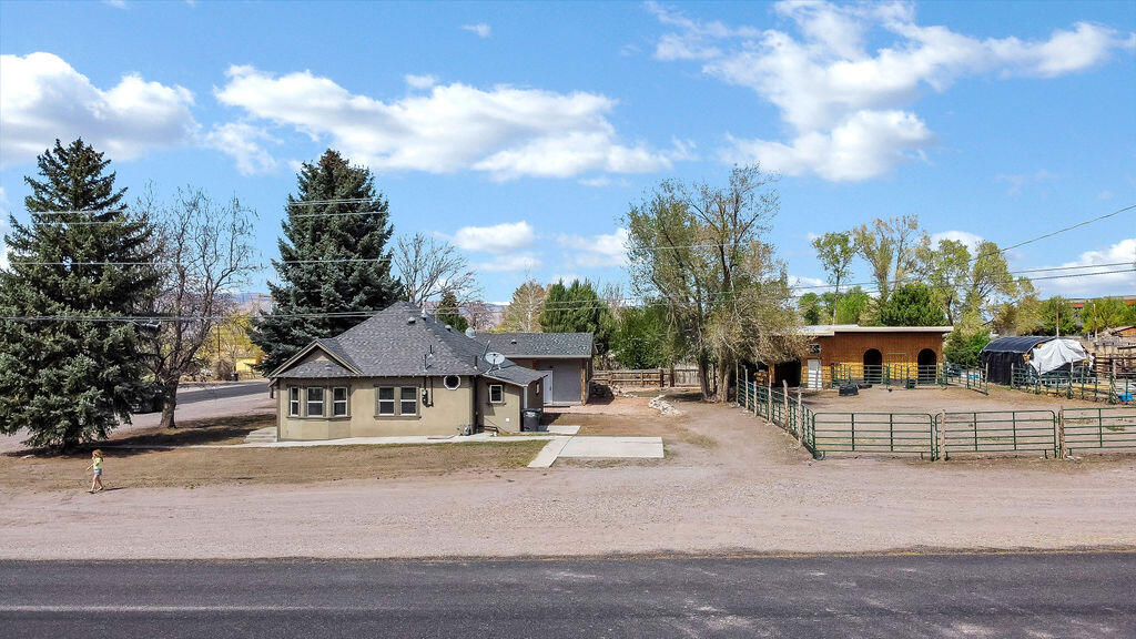 Corner Lot. Horse Property. Shop Space. Everything You've Been Looking For. This Monroe property truly has a little bit of everything. Sitting on a full half-acre corner lot, you've got space, flexibility, and opportunity all in one. The home itself is just under 1,200 square feet with 2 bedrooms and 1 bathroom - comfortable, manageable, and full of charm. But what really sets this property apart is everything that comes with it. You'll find a large detached structure of nearly 1,500 square feet that has been thoughtfully converted into a sound and recording studio. Whether you're a musician, content creator, or just want an incredible workspace - it's ready to go. And if that's not your thing, it can easily be converted back into an oversized garage or shop. Outside, the property is set up for animals with horse stalls and panels already in place, making it a great option for anyone looking for usable land with purpose. If you've been looking for a property that offers more - more space, more function, more potential - this one delivers. Ideal for the outdoorsman, hobbyist, or anyone wanting room to live and work without sacrificing convenience. Square footage figures are provided as a courtesy estimate only and were obtained from ______________ . Buyer is advised to obtain an independent measurement.