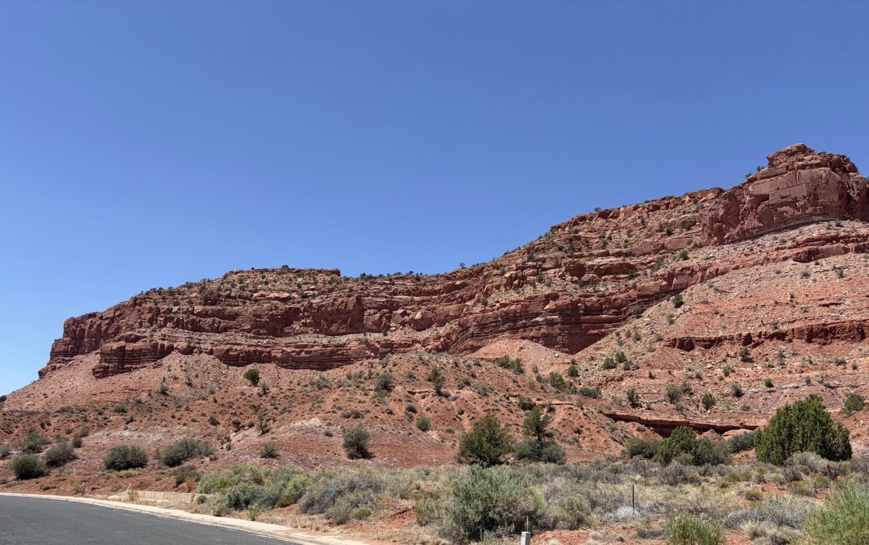 Lot 96 of Golden Circle Estates Subdivision has established CC&R's and is one of the best remaining lots in Kanab backing up to red rocks, unobstructed extraordinary views, excellent water drainage, and an enhanced feeling of privacy and exclusivity.  This unique 0.74ac lot is a must see that it is approximately 320 ft deep and has its own private ''box canyon'' area in the rear of the lot that is perfect for a gazebo or children's playhouse.  The curb, gutter, and sidewalk are in place, and all utilities are stubbed to property - Propane is available.