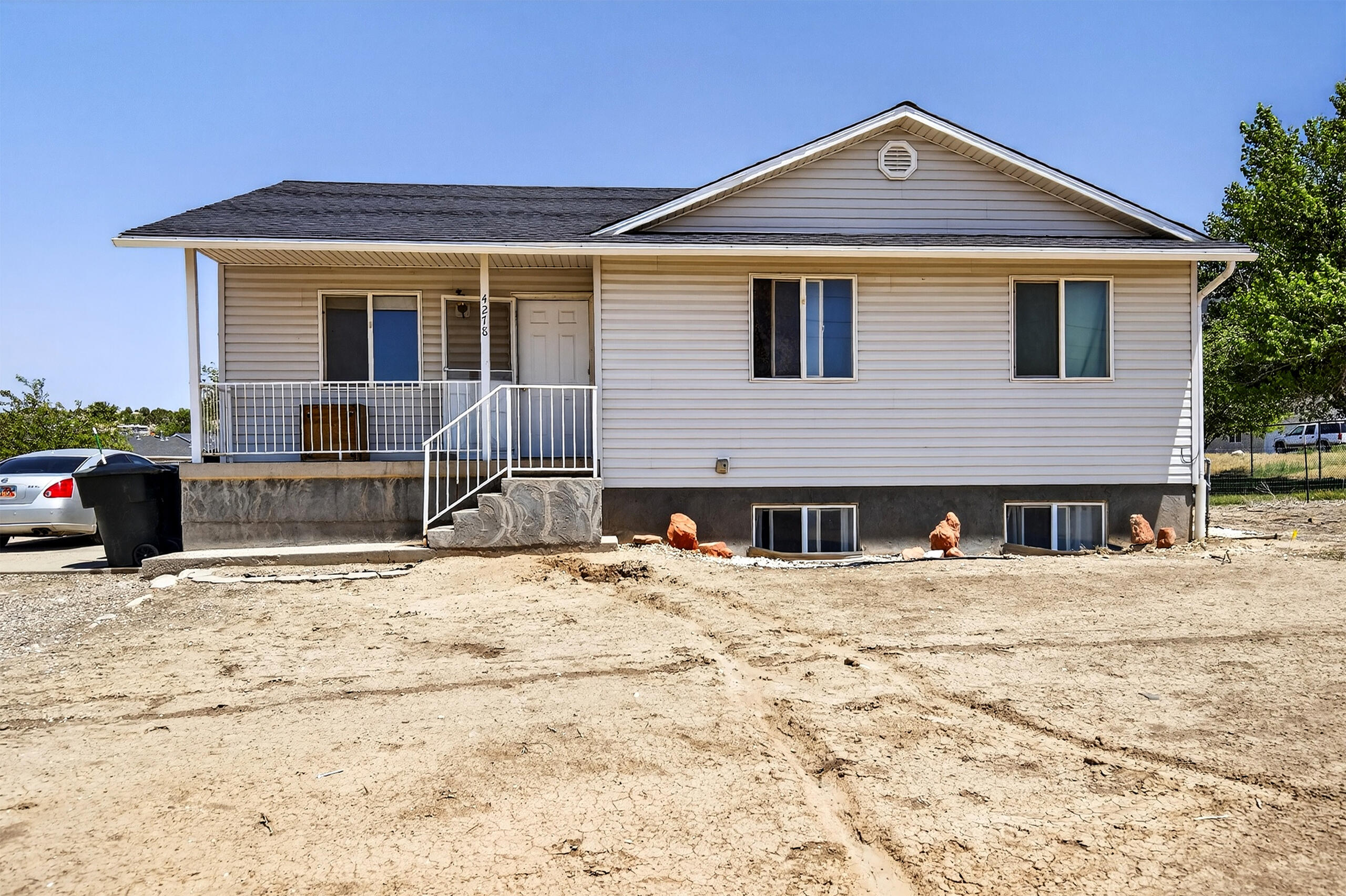 This property, located just off Old Highway 91 in Enoch, presents a unique investment opportunity. Currently functioning as a rental, both levels of the home are independently rented out, offering an excellent stream of income. Alternatively, it can be transformed into a spacious single-family residence, providing ample room for all family members. The main level offers 3 bedrooms, 1.5 bathrooms and has a comfortable space with its open floor plan, making it perfect for family gatherings and daily living. Downstairs, an additional 2 bedrooms, 1 bathroom and a full kitchen make this level perfect for generating rental income, providing privacy and self-sufficiency for tenants. The expansive backyard adds to the property's appeal, offering a vast space for recreation and gardening,