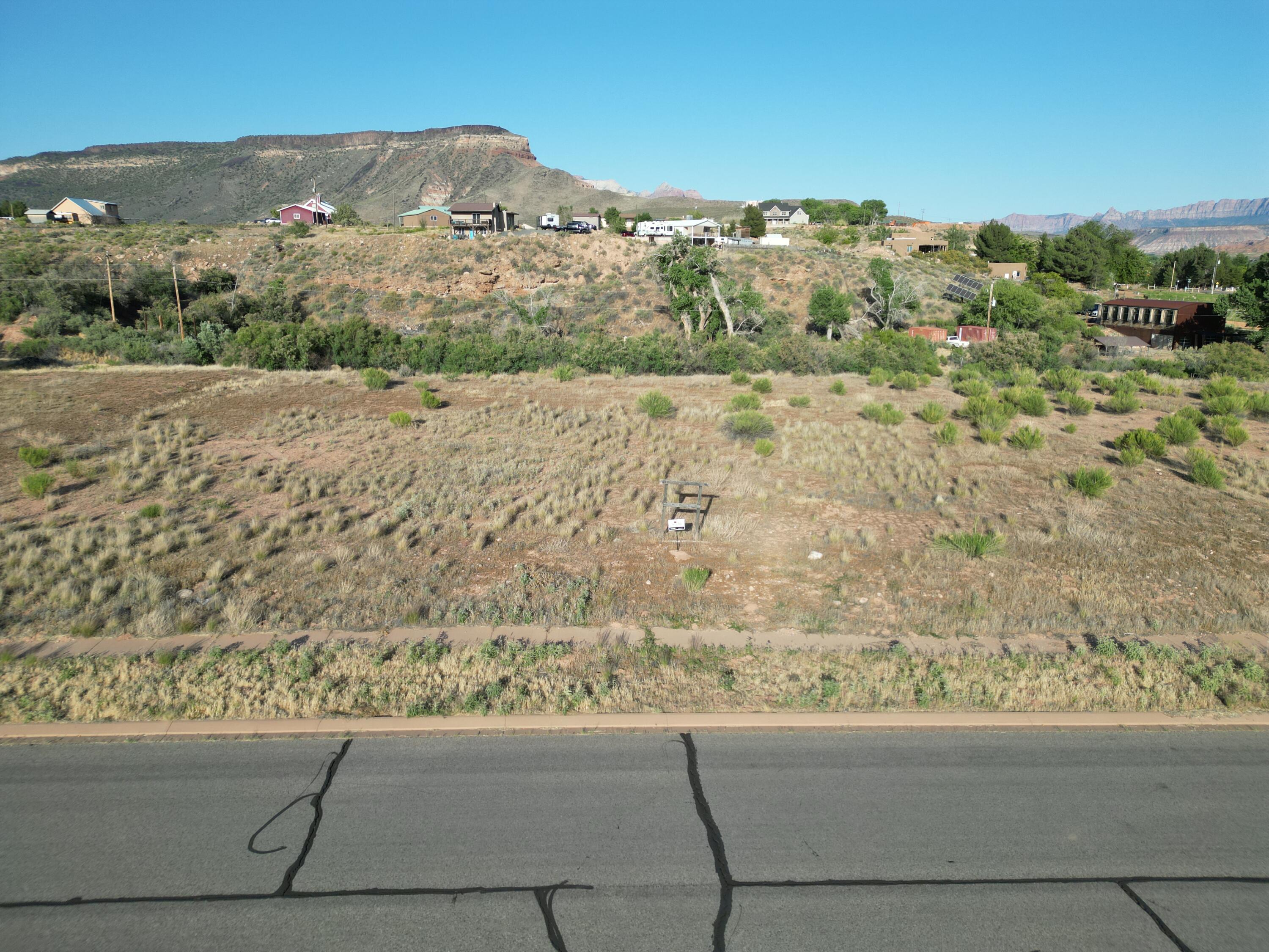 New Phase Release - Premium 1+ Acre Lots Now Available!
Visit our brand-new sales office at Sierra Bella in Virgin, Utah, just minutes from the entrance to Zion National Park.
This is your opportunity to own a slice of Southern Utah paradise! These fully improved 1+ acre homesites offer breathtaking views of the iconic Zion mesas and a rare rural residential setting--perfect for building your custom dream home.
With approved builders ready to go, you can begin the building process right away. Each lot includes:
• One share of pressurized irrigation water
• Culinary water connection
• Fully improved homesite
• Washington County Water Conservancy impact fees already paid
Prices start at just $235,000.
Don't miss this limited opportunity to secure your place in one of Southern Utah's most desirable communities.
All information is deemed reliable but not guaranteed. Buyer is responsible for verifying all information.
