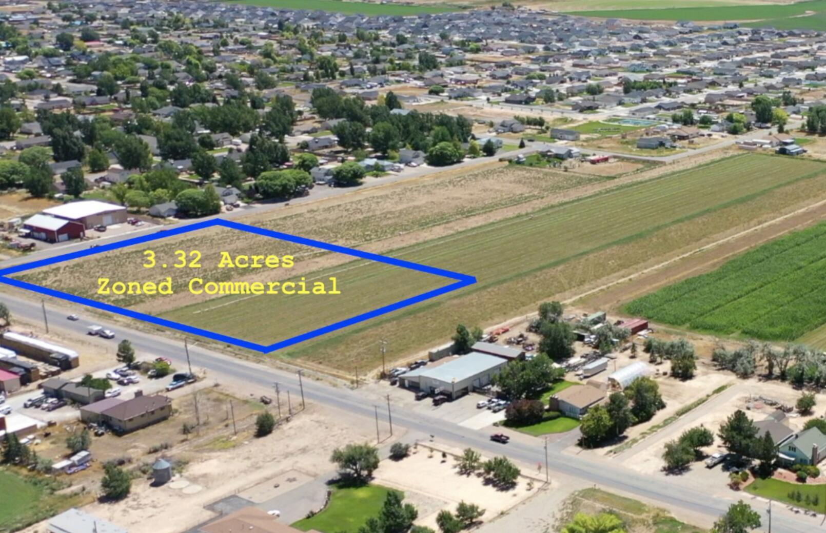 3.32 acres of of Commercial property with frontage to Midvalley Rd. 1 acre foot of water per acre included! Bring your business to this rapidly growing area.