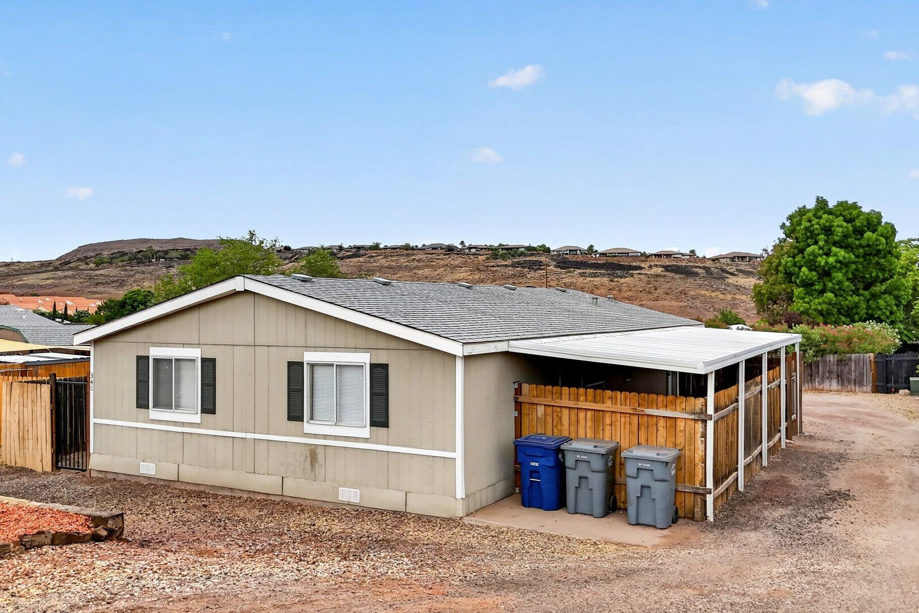 Affordable living with room to spread out! This 4-bedroom, 2-bath manufactured home sits on its own lot with no HOA, giving you the freedom and flexibility you've been looking for. The spacious lot offers plenty of room for parking, toys, gardening, pets, or future improvements. Enjoy relaxing or entertaining under the covered patio, perfect for year-round outdoor living.

Inside, you'll find a functional floor plan with ample living space for family and guests. Whether you're looking for a primary residence, investment property, or your first home, this property offers exceptional value and endless potential. Don't miss this opportunity to own an affordable property with space, privacy, and room to make it your own.