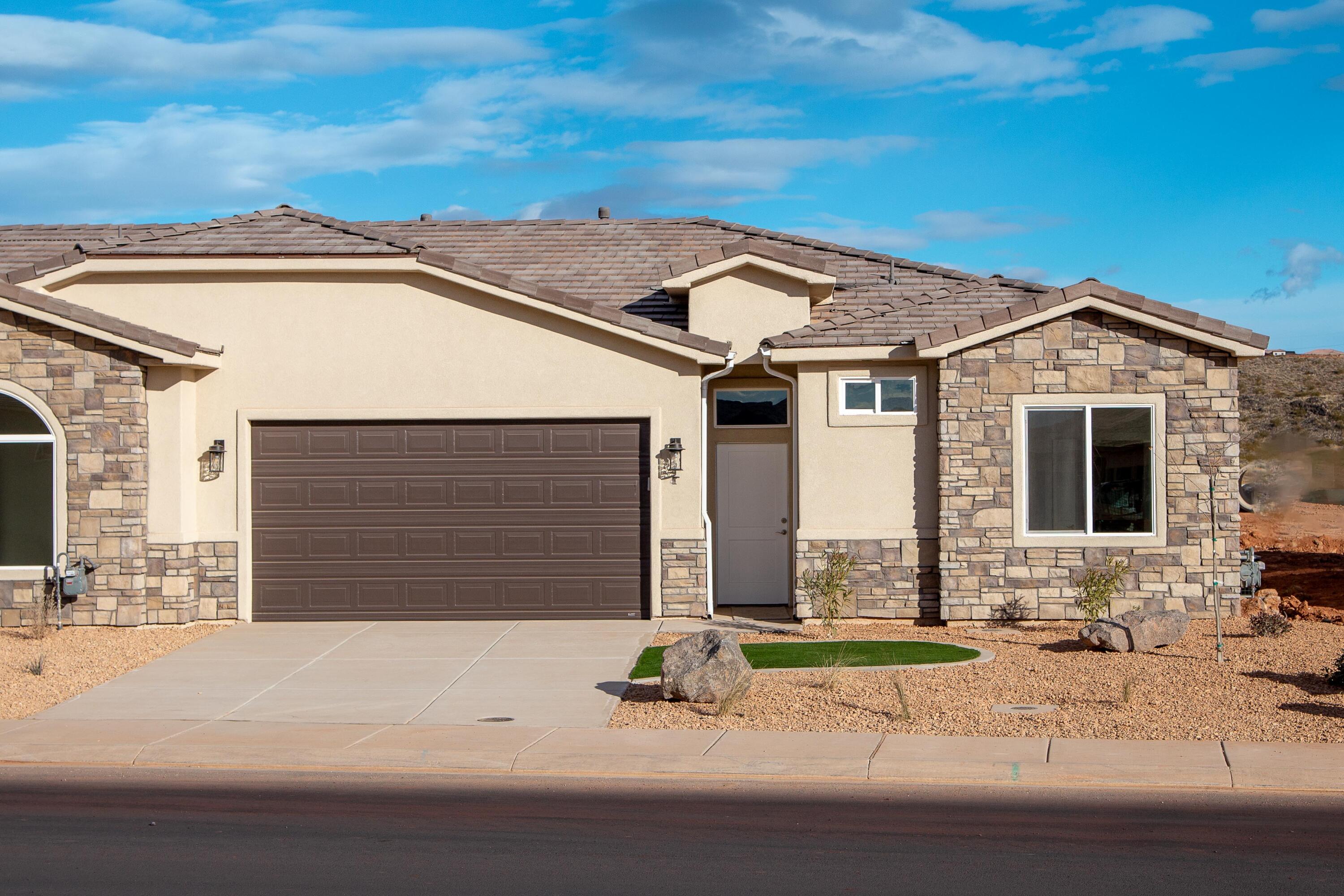 Now offering $10,000 in builder incentives to use toward closing costs, rate buy downs or extras! of the few single-story townhomes in the area, this home has many high-end features including porcelain wood-grain tile floors, 10' ceilings, fully tiled walk-in shower with a big glass door, stained hardwood cabinets with soft-close hinges and under cabinet lighting, 3 cm thick quartz counter tops throughout, two-toned paint job for extra style, fully-finished garage, covered patio, block wall and fully-landscaped backyard with turf, top-notch plumbing fixtures, and an aesthetically pleasing, energy-efficient stucco and stone exterior with super-durable concrete-tile roof! Plus RV parking! Leaseback program available.