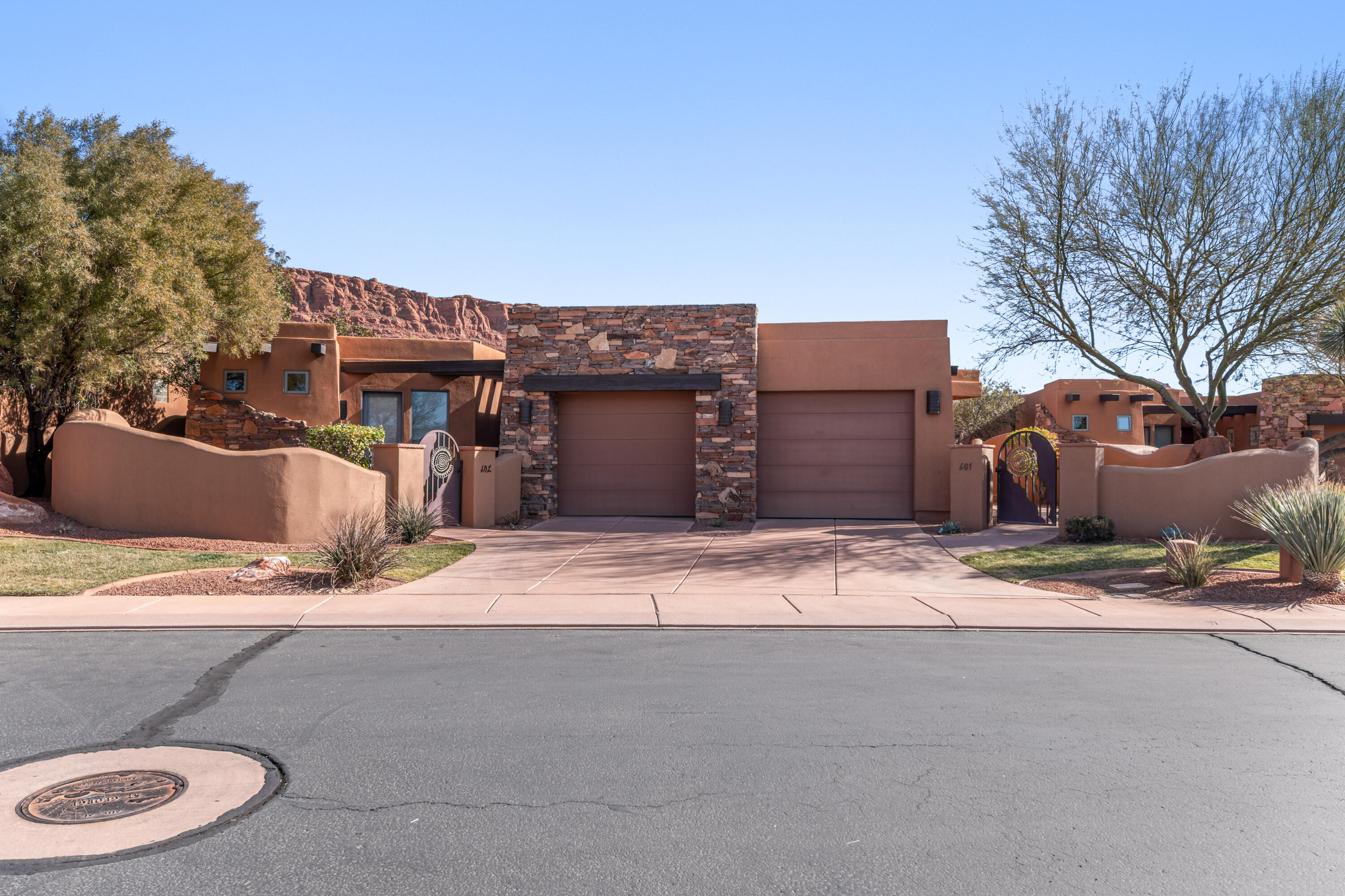 **Rare Entrada Rental Pool Opportunity — Two Units in One**

Here's your chance to join the exclusive Inn @ Entrada Nightly Rental Pool. This fully furnished home includes two separate units—rent them together or separately. The main side has 2 beds, 2 baths, a full kitchen, spacious living area, and a private patio. The second is a 1-bed, 1-bath with a kitchenette and its own entrance. Two garages. Two kitchens. Two patios. One smart investment. As part of the rental pool, owners receive income not just from their home, but from the entire Inn @ Entrada program. Management handles everything—bookings, upkeep, even utilities—so you can relax, whether you're earning or visiting. Want to use it yourself? Just block out your dates and enjoy the red rock views, peaceful atmosphere, and... Entrada lifestyle. Partially Refundable Equity Membership Transfer Fee will need to be paid by the new owners.