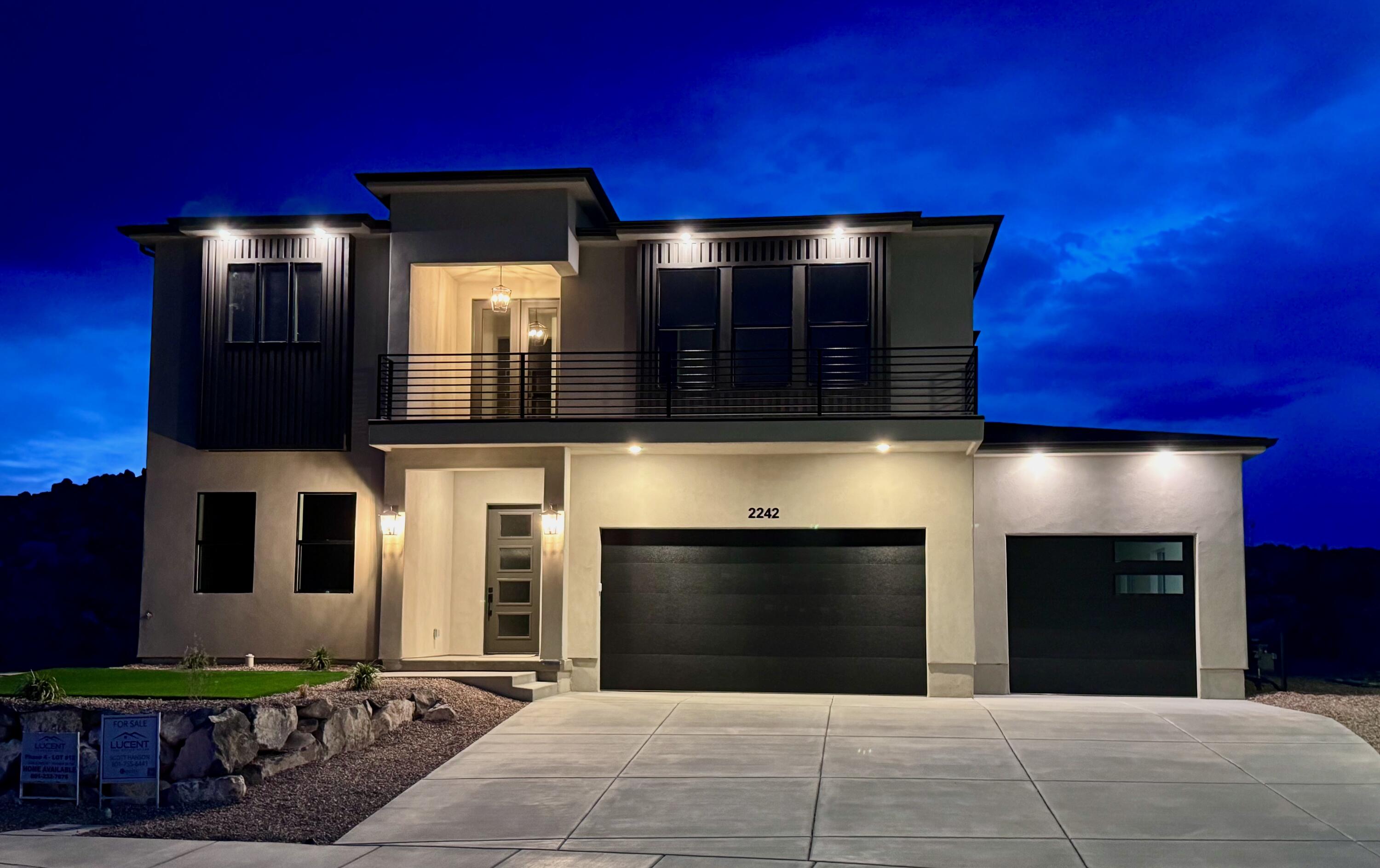 **$10,000 toward buyer closing costs/concessions** Experience luxury and modern living in this stunning, modern two-story home located in the beautiful Talon Pointe at South Mountain development. Oasis is not just a home; it's a sanctuary where comfort meets modern elegance, surrounded by breathtaking mountain views. 3 car garage fully finished with workshop area, 4 Beds, 3 Baths, and main level office that can be converted to a 5th bedroom. 10' ceilings on main, 9' ceilings on 2nd floor. Luxurious primary suite/ensuite features private covered patio, walk-in closet, tile flooring with oversized rain shower, soaking tub, dual vanity, makeup desk and all granite or quartz surfaces. Large Laundry Room, custom cabinetry and sewing/crafting desk. Gourmet Kitchen equipped with stainless 36'' gas range, refrigerator, disposal and dishwasher. Large Windows provide natural light and contribute to a spacious open feeling. Oversized Island. Granite Surfaces and tile backsplash. Walk-In Butler Pantry. Adjoining Dining Area and Great Room is ideal for entertaining and family gatherings or just relaxing. The fully landscaped yard includes a sprinkler/drip system, artificial turf, desert friendly plants and xeriscaping for low-maintenance. Two units and zoned HVAC systems keeps Oasis comfortable year-round. 240v/50 amp outlet in garage provides access for EV charging, RV plug-in or specialty tools. Solar-Ready Electrical Panel. See virtual tour for more! Square footage figures are provided as a courtesy estimate only and were obtained from architectural plans. Buyer is advised to obtain an independent measurements and verify property taxes with Iron County.