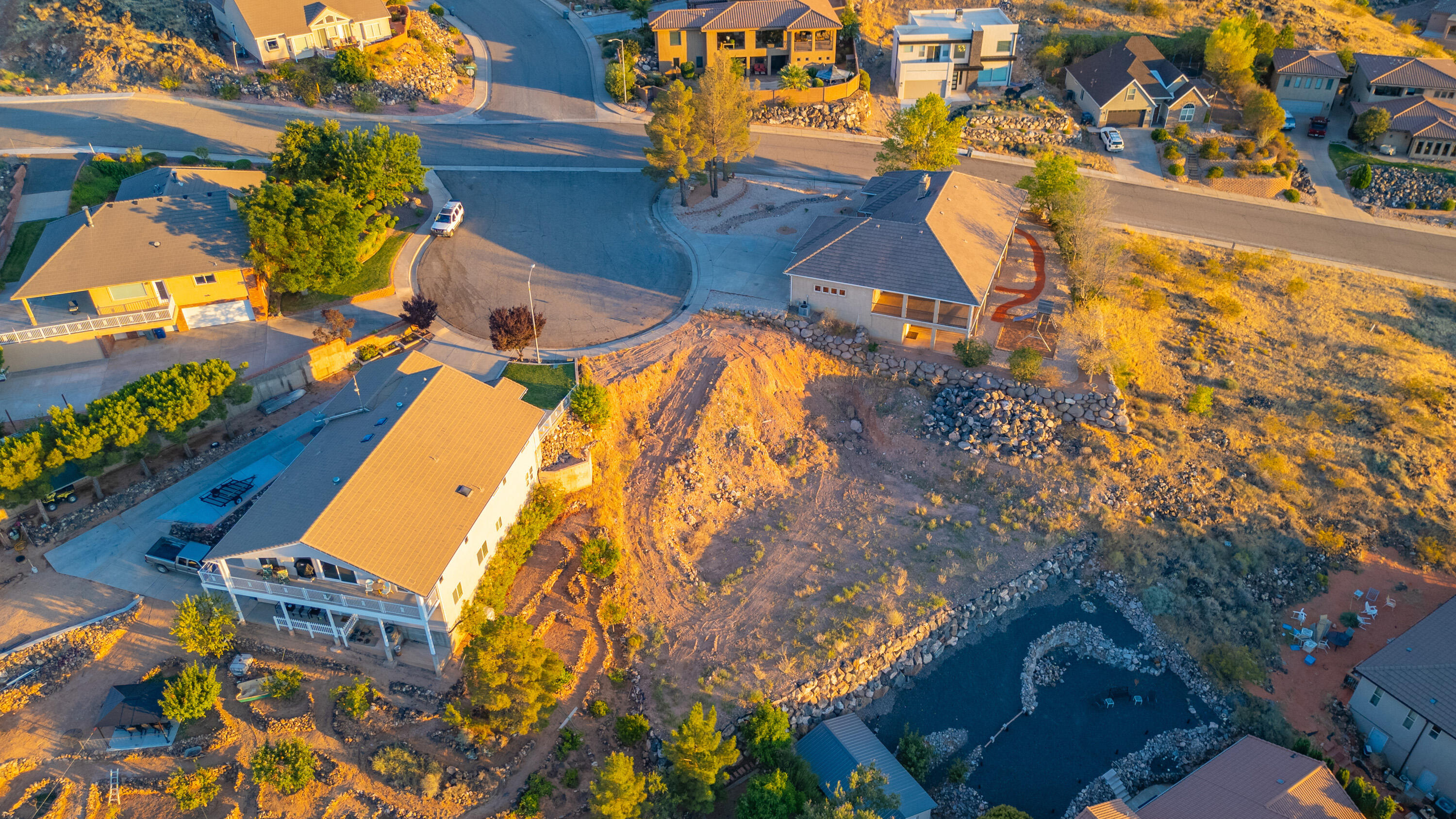Nestled on the scenic hillside of Spilsbury Court in a quiet cul-de-sac, this premium homesite offers breathtaking views and exceptional potential, with ample space for a pool. Excavation has already been completed, providing a strong foundation for your custom dream home. The lot includes a finalized floor plan, with opportunities to customize details to match your vision. Premier builder information and floor plans are available upon request. A rare opportunity to own a hillside property in a desirable setting.