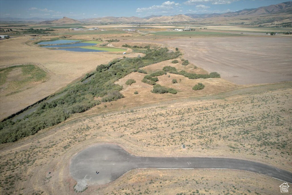 This 6.24 acre homesite combines privacy with natural beauty and 125 feet of direct Cub River access. The gently rolling land offers excellent building potential and space for recreation. Located just 15 minutes from Cherry Peak Ski Resort.