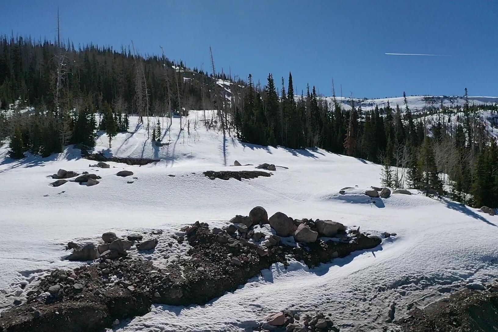 Skip the blank-page phase with this 1.59-acre mountain homesite in Steam Engine Meadows, minutes from Brian Head Resort. Surrounded by pines and aspens, it offers year-round paved access, city water, and available sewer, power, and natural gas. The seller reports more than $200,000 invested in architectural design, engineering, grading, and site preparation. Proposed plans feature a 4,702 sq. ft. contemporary mountain home with an attached garage, primary suite, additional bedrooms, bunk room, two offices, butler's pantry, covered terrace, fire pit, and sun decks. A separate design adds guest living above a detached garage and storage area. Plans and renderings are available. Buyer to verify plans, approvals, permits, utilities, costs, and transferability.