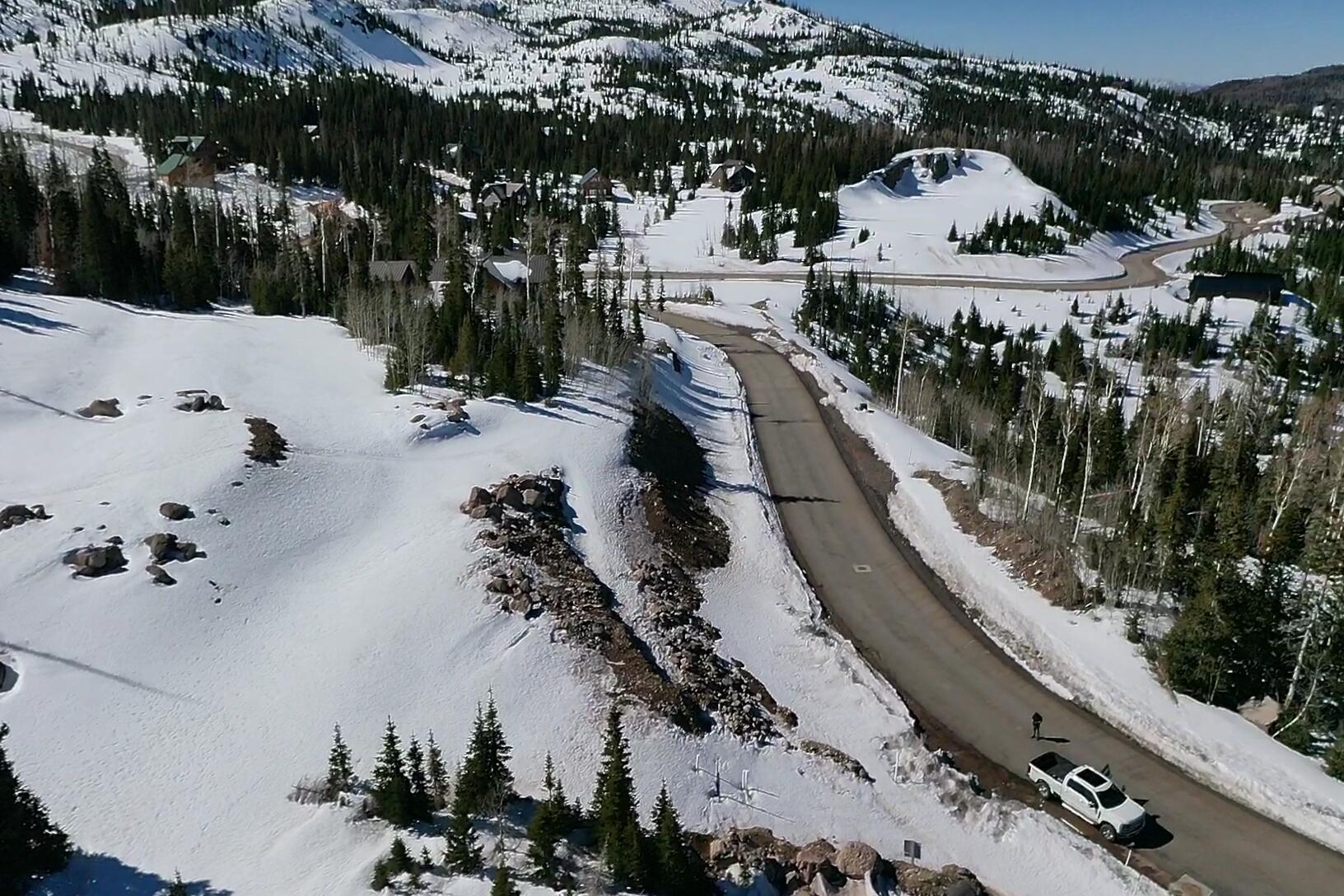 1.59-acre lot located just minutes from Brian Head Ski Resort, offering mountain views and a setting surrounded by pines and aspen trees. With over $200,000 invested in engineering, architectural plans, and site preparation, this property is well-positioned for future development. Whether building now or planning ahead, you can build your cabin in the only subdivision with year round access, paved roads, and all utilities in Brain Head with only a $200 annual HOA fee.
