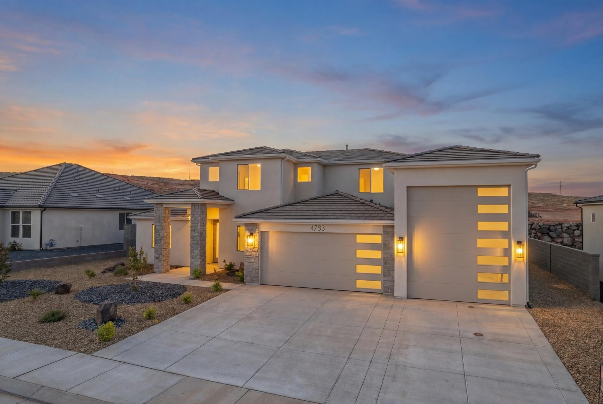 ~52' DEEP RV GARAGE~ 

FULL LANDSCAPING INCLUDED

This stunning 2 LEVEL home in Sand Hollow Village has a massive 52-FOOT DEEP RV GARAGE (12' wide x 14' tall door)! 

THIS IS IDEAL FOR: an adventure lover who needs a 52-ft deep RV garage for their toys, values luxury finishes, and wants to unwind in a spacious backyard just minutes from Sand Hollow's dunes and lake.

Ask about adding a pool!

Smart Home: This property comes equipped with premium SMART HOME features including 3 wired in insecurity cameras and a door bell camera. Just minutes from Sand Hollow Reservoir, Sand Hollow Golf Course, the sand dunes, and Zion National Park, you're surrounded by year-round adventure! Contact the Listing Agent for a private showing or to ask about additional incentives and options!