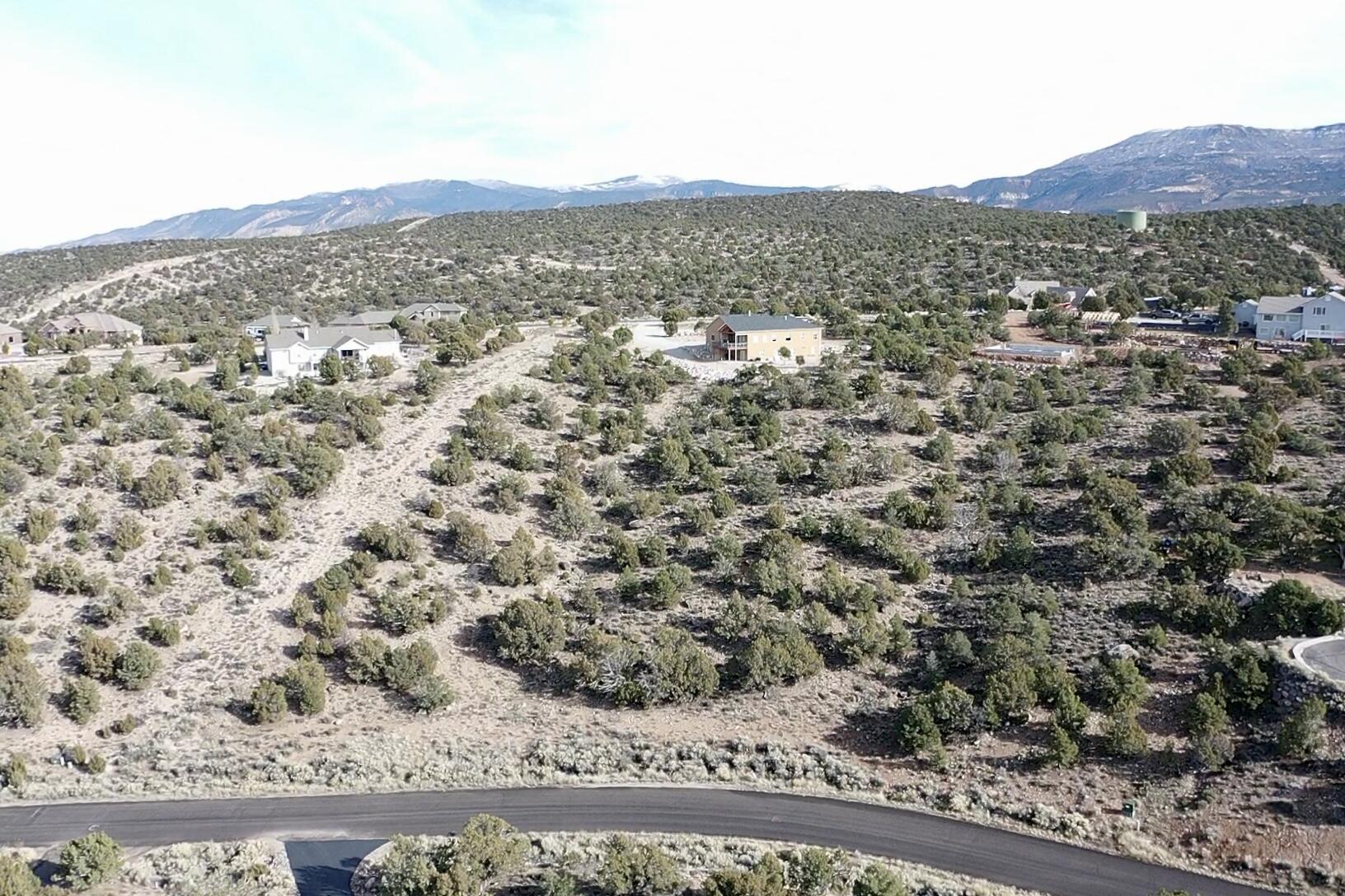 Discover the perfect place to build your dream home on this spacious 2.03-acre lot nestled in the desirable Northridge subdivision. Enjoy sweeping west-facing views—ideal for watching vibrant sunsets over the valley. The lot offers a peaceful setting with protective CC&Rs that preserve the integrity and beauty of the neighborhood while allowing flexibility for your custom build. With ample space for a shop, animals, or outdoor living, this property offers a rare blend of privacy and community in one of the area's most sought-after locations.