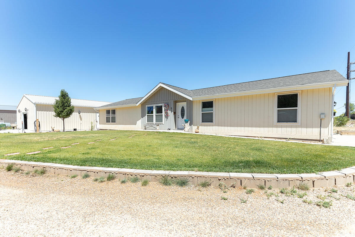 Welcome Home! This 5-bedroom, 3-bath home offers 2,312 sq ft of open-concept living, ideal for both everyday life and entertaining, plus a large detached workshop/garage with a utility sink--perfect for a hobby space. Attached is a 600 sq ft, 1-bed/1-bath ADU with a full kitchen, currently renting for $1,000/month for built-in income potential. Parowan Creek runs along the north side, complete with a seasonal waterfall, plus mountain views and frequent wildlife sightings. Located within city limits of quiet, historic Parowan, the property allows animals and is walkable to a grocery store and restaurants. Major shopping and medical facilities are 20-30 minutes away, with freeway access just 2 miles out. Brian Head Ski Resort and Cedar Breaks National Monument are minutes away.