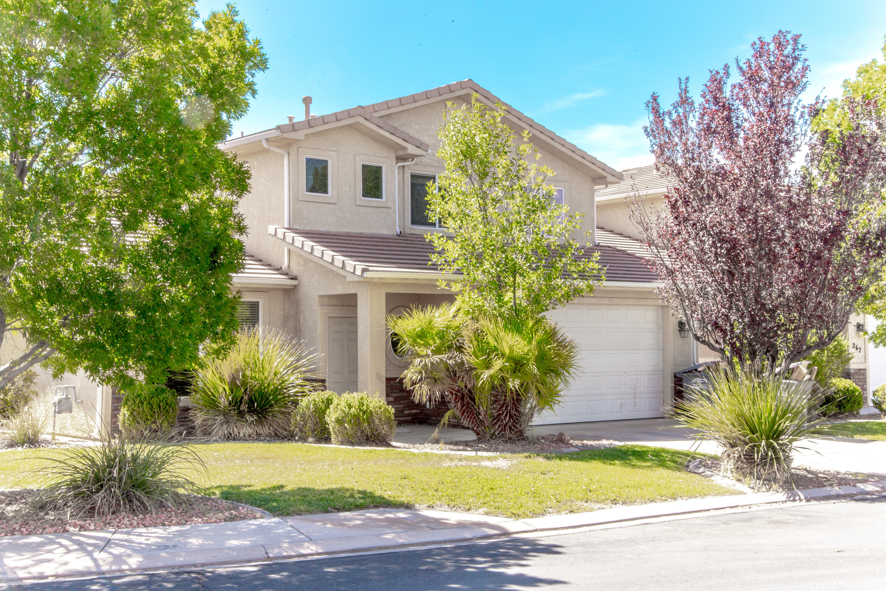 Here's a nice big townhome in the lovely Sky Ridge Townhomes. The area is built out, so you'll be far from all the construction and dust you get with newer townhomes. The home has some durable tile floors and hardwood cabinets. Upstair living area has some nice views of the West Temple. HOA dues cover landscaping maintenance in front and backyards, common areas with include a dog park and a couple community parks. RV parking in the gated community lot is available for $50 per year.
