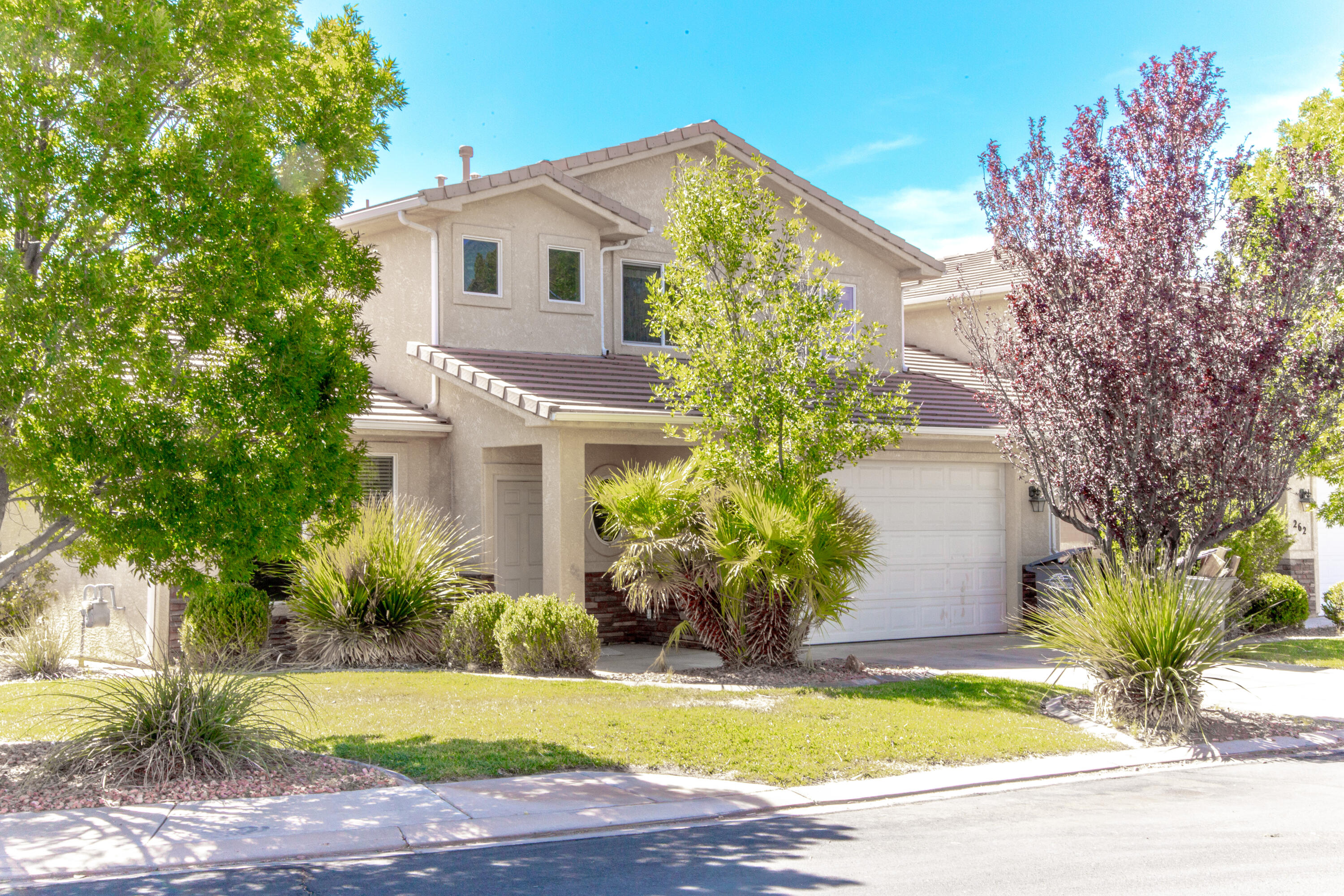 Here's a nice big townhome in the lovely Sky Ridge Townhomes. The area is built out, so you'll be far from all the construction and dust you get with newer townhomes. The home has some durable tile floors and hardwood cabinets. Upstair living area has some nice views of the West Temple. HOA dues cover landscaping maintenance in front and backyards, common areas with include a dog park and a couple community parks. RV parking in the gated community lot is available for $50 per year.