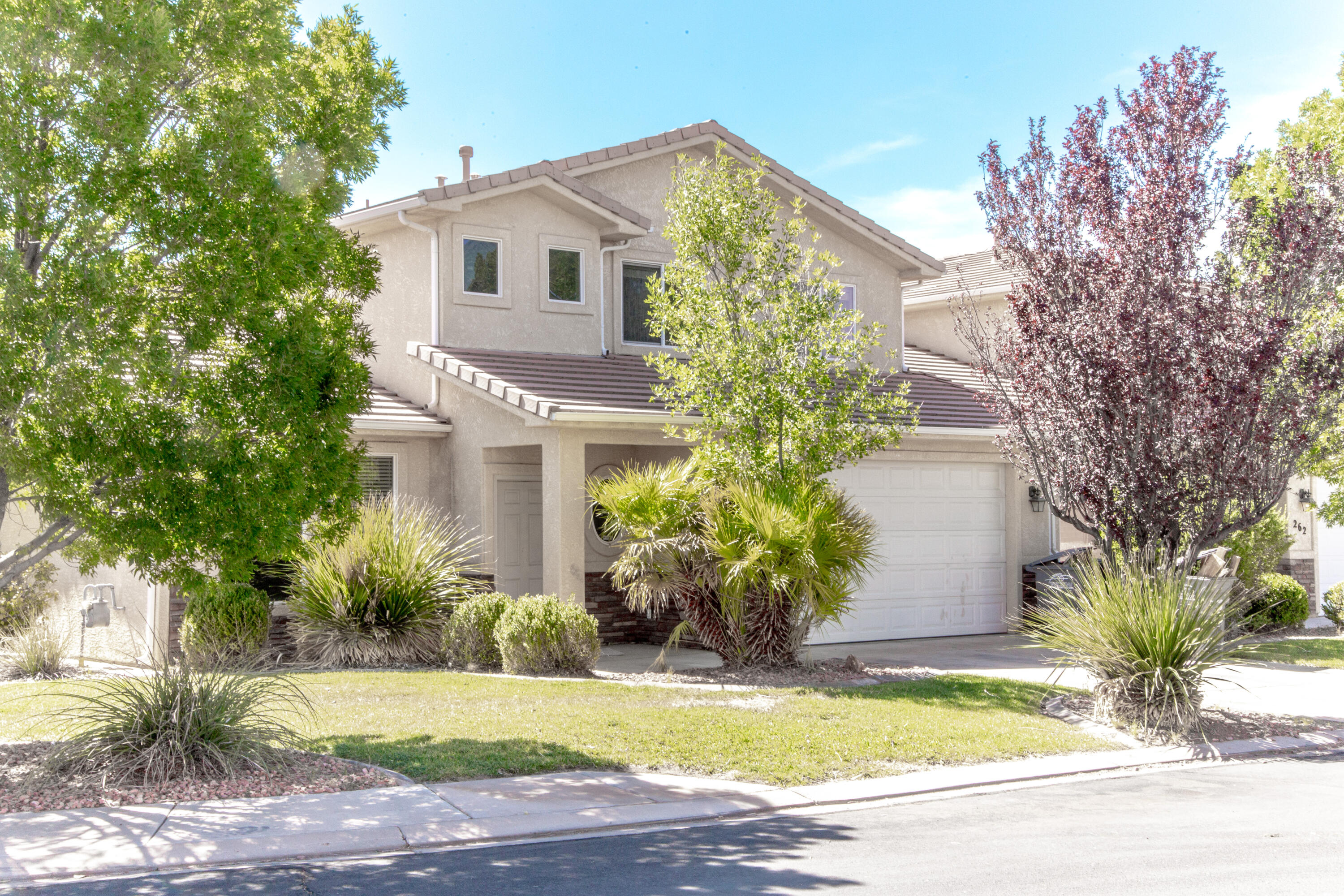 Here's a nice big townhome in the lovely Sky Ridge Townhomes. The area is built out, so you'll be far from all the construction and dust you get with newer townhomes. The home has some durable tile floors and hardwood cabinets. Upstair living area has some nice views of the West Temple. HOA dues cover landscaping maintenance in front and backyards, common areas with include a dog park and a couple community parks. RV parking in the gated community lot is available for $50 per year.
