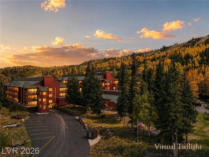Get away to Giant Steps Condos in Brian Head, UT...America's highest resort town! This desirable & coveted corner unit offers true ski-in, ski-out access--step outside, glide to the renowned Giant Steps lift, & spend the day on the slopes. Perfect as your Southern Utah basecamp, you'll enjoy year-round adventure just 3 hours from Las Vegas, 4 hours from Salt Lake City, & easy access to Cedar City & Parowan. Explore Cedar Breaks National Monument (5 min), Navajo Lake (20 min), Duck Creek Village (25 min), Panguitch Lake (30 min), Bryce Canyon National Park (60 min), Zion National Park (2 hrs), & countless hiking, mountain biking, ATV/UTV, fishing, & scenic drives throughout Southern Utah. The 2-bedroom, 2-bath condo features an open, airy floor plan with kitchen, dining, & living areas, plus a wraparound covered deck showcasing breathtaking panoramic mountain views. Extensive updates include a wood fireplace insert with new chimney liner, new blinds throughout, new refrigerator, all new furniture, updated baseboards & moldings, refreshed cabinetry, new bathroom flooring, toilets, sinks, faucets, mirrors, upgraded lighting, new water heater, & new main water valve. Community amenities include a clubhouse with spa, game room, laundry facilities, covered parking, & year-round access. Furniture is included, making this a truly turnkey mountain retreat. Seller will provide a home warranty up to $500 for added peace of mind & offer $5,000 toward an interest rate buy-down or the buyer's closing costs, helping make ownership even more affordable. Whether you're seeking a personal getaway, vacation rental, or four-season escape, this exceptional property delivers the best of Brian Head & Southern Utah adventure.