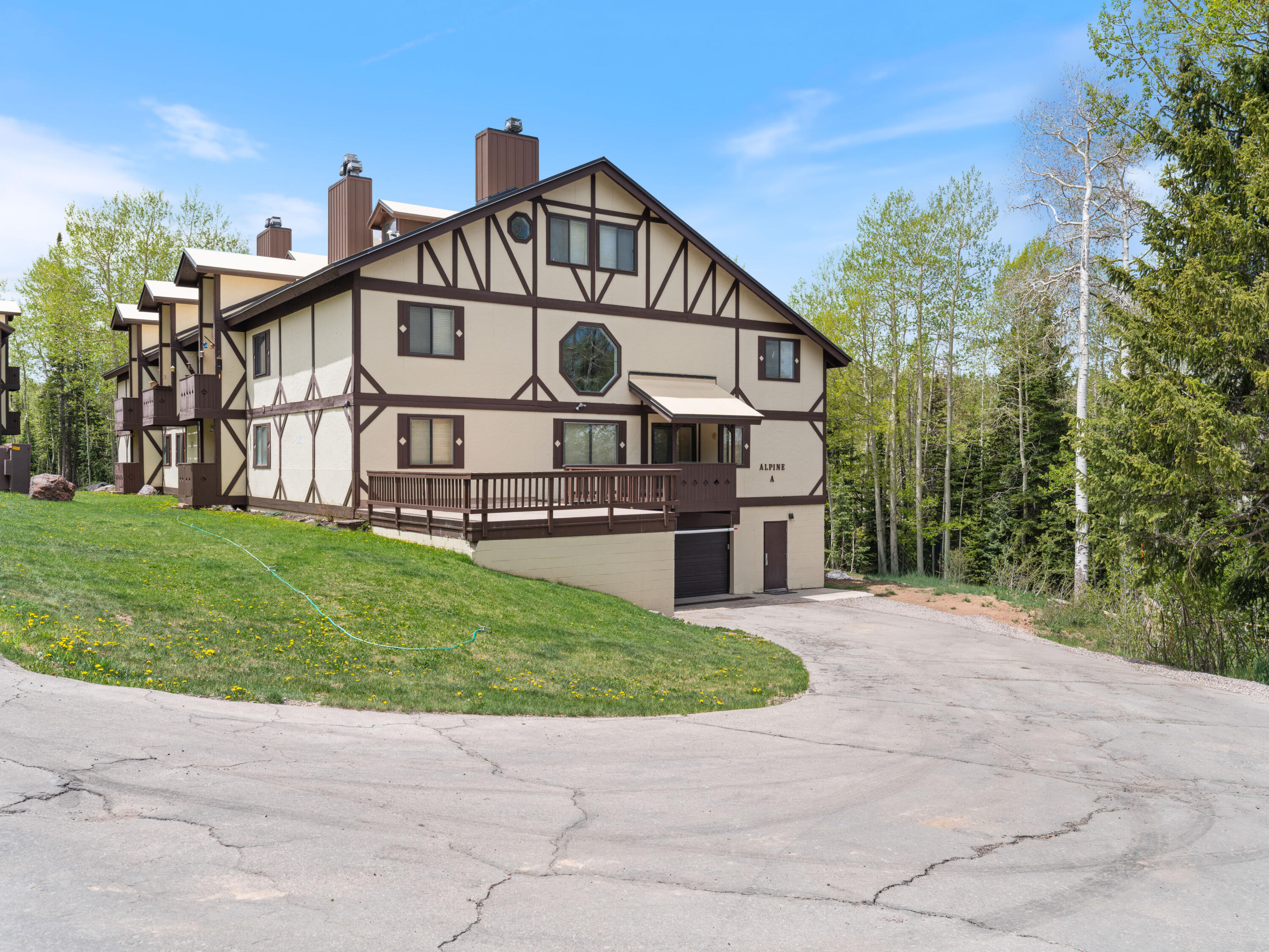 Updated Mountain Condo with Peaceful Forest Setting | Tucked into one of the quieter areas of the resort, this remodeled condo offers the kind of mountain setting people come to Brian Head for. Surrounded by mature trees and overlooking peaceful forest views, the usable deck becomes an easy place to spend cool summer evenings or unwind after a day on the mountain. Inside, the condo has been tastefully updated and is in excellent condition, with comfortable living spaces, modern finishes, and plenty of room for family and friends. Whether you're looking for a full-time mountain home, a vacation getaway, or a shared-ownership opportunity, the layout offers flexibility without sacrificing comfort. Move-in ready and designed for easy mountain living!