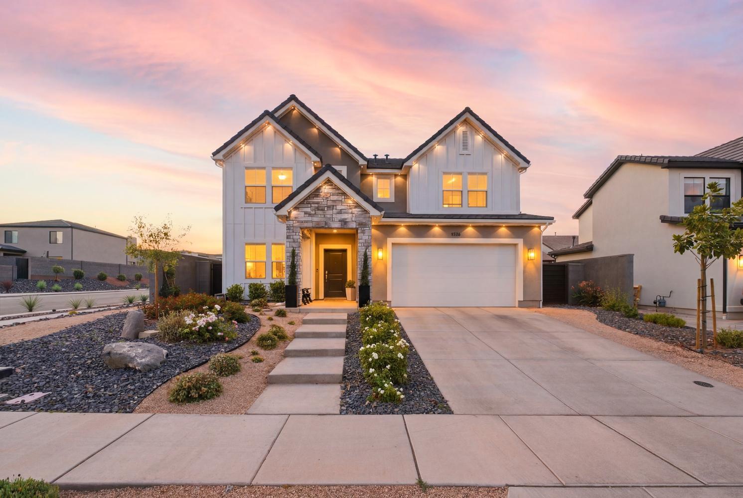 Welcome to this beautifully designed modern farmhouse situated on a desirable corner lot in Long Valley, offering the perfect blend of functionality, style, and community living. Thoughtfully designed with a family-friendly floor plan, this home features abundant natural light, an open-concept layout, and exceptional indoor-outdoor living spaces.

The spacious entry welcomes you into a versatile study with French doors, ideal for a home office, playroom, or flex space. The heart of the home is the oversized kitchen island that seamlessly connects the kitchen, dining area, and great room, creating an ideal setting for both everyday living and entertaining. Custom touches throughout the home include wainscoting, textured accent walls, custom blinds, ceiling fans, a functional mud room, and thoughtfully designed storage solutions.

Upstairs, you'll find a spacious loft that provides additional living space perfect for a media room, homework station, or game room. The primary suite offers a peaceful retreat with a spa-inspired ensuite featuring dual vanities, a separate shower, soaking tub, and oversized walk-in closet.

Step outside to enjoy the extended covered patio, additional patio lighting, and low-maintenance turf designed for year-round enjoyment. The private backyard includes garden lighting, a dedicated garden space with trellis, mature grape vines, and gated privacy for comfortable outdoor living. The patio furniture and fire pit are negotiable, allowing the next owner to easily continue enjoying the outdoor entertaining space.

Additional features include a 3-car garage with extra cabinetry, shelving, and a 220 EV charging outlet. Permanent eave lighting adds beautiful curb appeal and year-round convenience.

Located in the highly desirable Long Valley community, residents enjoy access to exceptional amenities including pools, hot tubs, splash pads, basketball courts, pickleball courts, covered playgrounds, play fields, and an extensive network of walking an