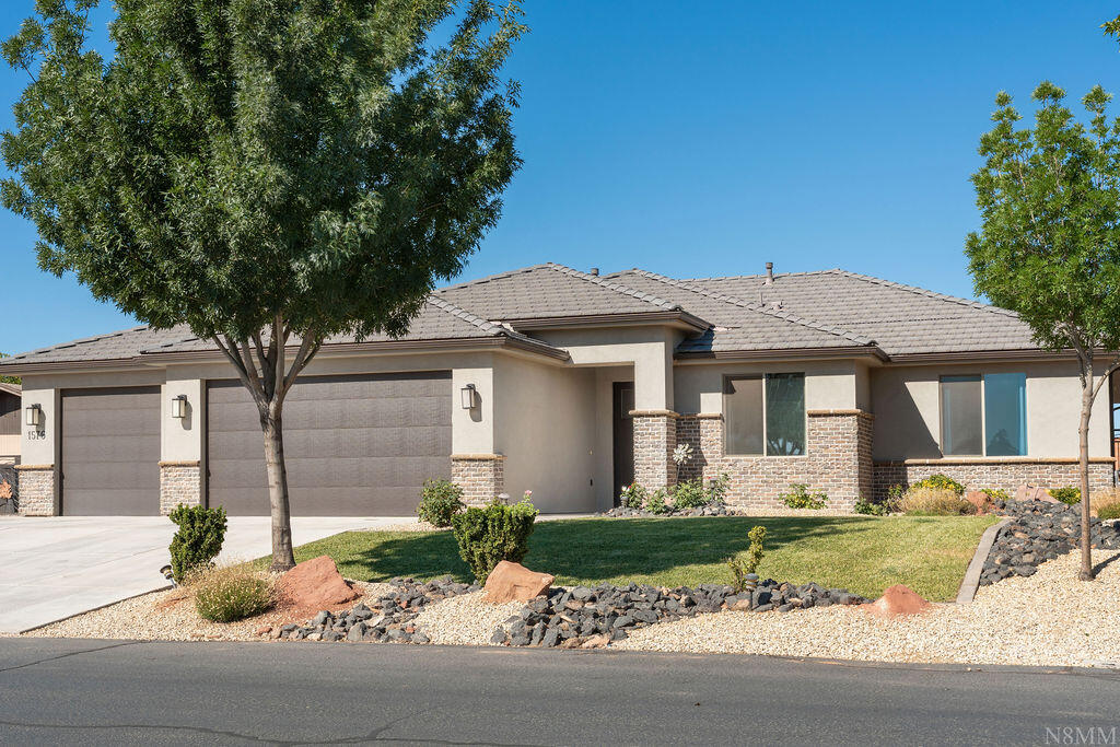 Discover your perfect St. George home in the highly sought-after Bloomington Hills neighborhood. This beautifully maintained 4 bedroom, 2.5 bath residence offers an ideal blend of comfort, convenience, and value, just minutes from top-rated schools, shopping, dining, golf, and parks. Zoned schools include Bloomington Hills Elementary, Sunrise Ridge Intermediate, Desert Hills Middle School, and Desert Hills High School, which each school is only a short distance away. Please verify boundaries if important. Conveniently located minutes from Sprouts Farmers Market and Dixie Meats. Little Valley Park is very near too.
Highlights you'll love include a spacious, light-filled layout with versatile living and entertaining spaces. Enjoy a large, private backyard with mature landscaping (fruit trees) that offers room to relax, play, or add a pool. There are no neighbors directly in front, providing added privacy and open views. An oversized 3 car garage is complemented by a large RV and boat parking area. The property is on Dixie Power, offering some of the lowest electric rates in the nation.
Additional features include a welcoming entry, a well-appointed kitchen, a generous primary suite, ample storage, no HOA, and excellent curb appeal on a quiet, established street. This is a rare find in an iconic location, move-in ready and designed for the St. George lifestyle.