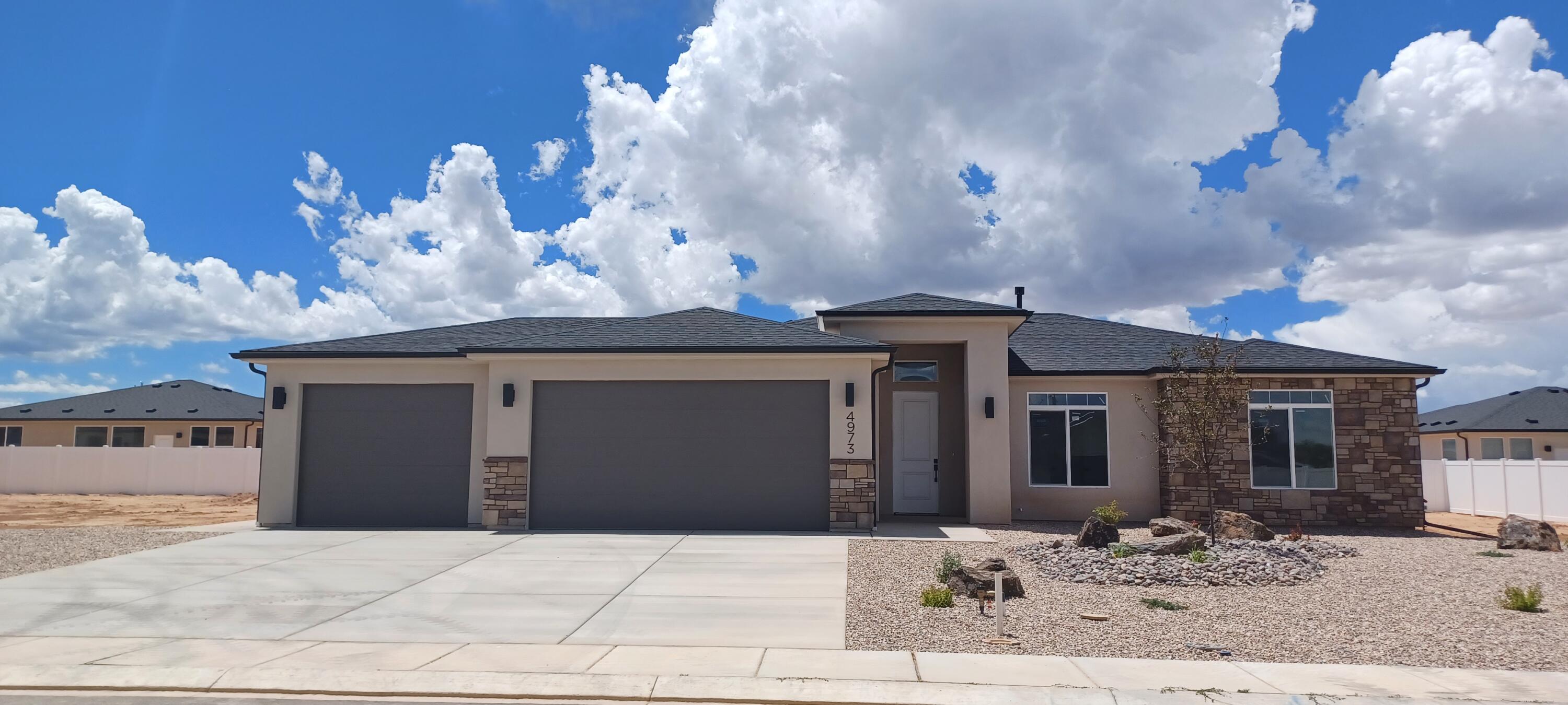 Introducing the Slate floor plan, this beautiful single-level residence offers three bedrooms and two and a half baths. This home includes a spacious three-car garage, an open floor plan designed for modern living, and a covered patio for outdoor enjoyment. The kitchen boasts an island and a walk-in pantry, enhancing both functionality and style. Additional features include a dedicated laundry room, and a master suite equipped with double sinks and a walk-in closet. Perfect for those seeking convenience and comfort in a thoughtfully designed space. Backyard fencing and front landscaping are to be included, along with refrigerator, adding to the home's overall value and convenience. Ask about our preferred lender incentives.
