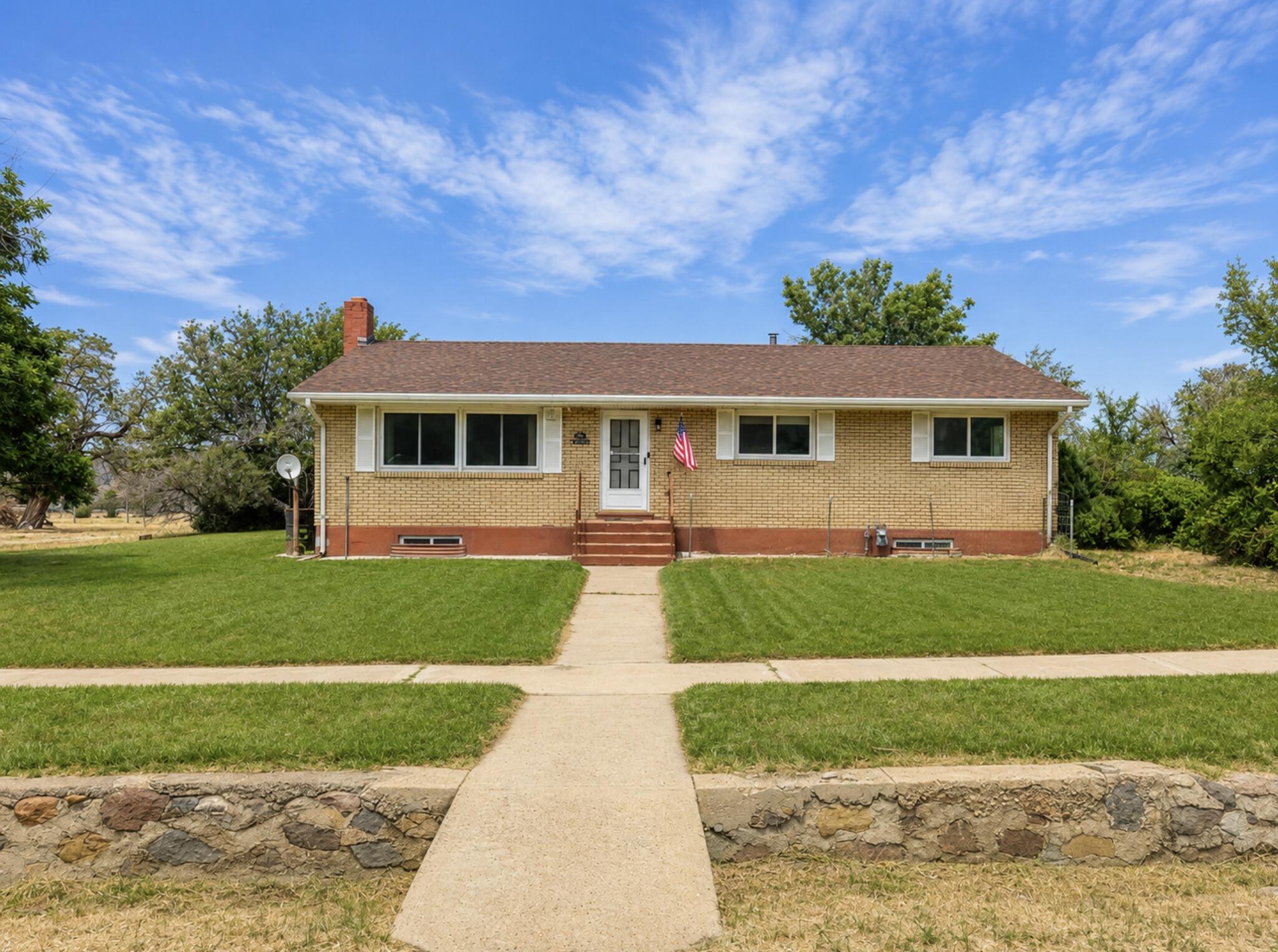 Enjoy small-town living with the convenience of nearby amenities in this 4-bedroom, 2.5-bath home in Summit, Utah. Built in 1978, this 2,688 sq. ft. home sits on a spacious 0.54-acre lot with animal rights and plenty of room to enjoy the outdoors. The mid-century design offers character and charm, while the wood-burning stove creates a warm, inviting atmosphere. Generous living spaces provide flexibility for family living, hobbies, or entertaining. With great bones and endless possibilities, this property is ready for your personal updates and vision. A rare opportunity to own a rural property with space, location, and so much potential.