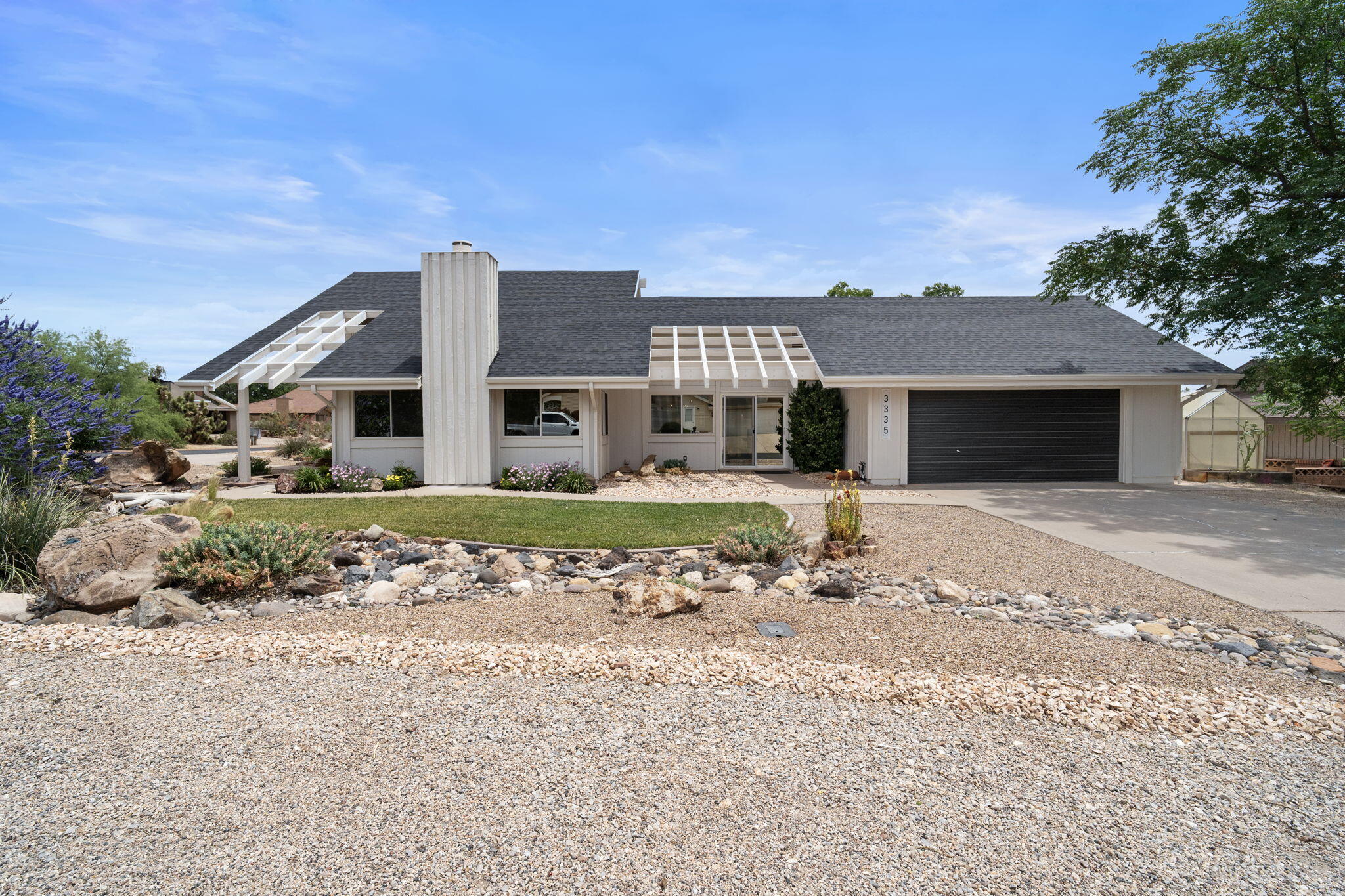 Beautifully updated and impeccably maintained, this stunning corner-lot rambler with a loft offers the perfect combination of comfort, style, and Southern Utah adventure just two blocks from BLM land! Inside, you'll be welcomed by soaring vaulted ceilings, updated LVP flooring, custom lighting, and thoughtfully refreshed finishes including a recently redone ceiling and newer interior paint that create a bright, modern feel throughout the home. The spacious primary suite is a true retreat with an oversized walk-in closet, while the versatile loft serves as an ideal guest getaway featuring its own kitchenette, private bathroom, and charming porch. Step outside to your own backyard oasis complete with a large awning-covered patio, relaxing above-ground hot tub, beautiful mountain views, and plenty of space to entertain, garden, or make the yard your own private escape. Enjoy added peace of mind with major updates including a newer roof, HVAC system, water heater, kitchen appliances, and water softener. With RV parking, two lifetime storage sheds, and an unbeatable location near endless outdoor recreation, this home truly has it all. Buyer to verify all information, deemed reliable, however buyer to verify all info including utilities, rental restrictions, and HOA information if applicable.
