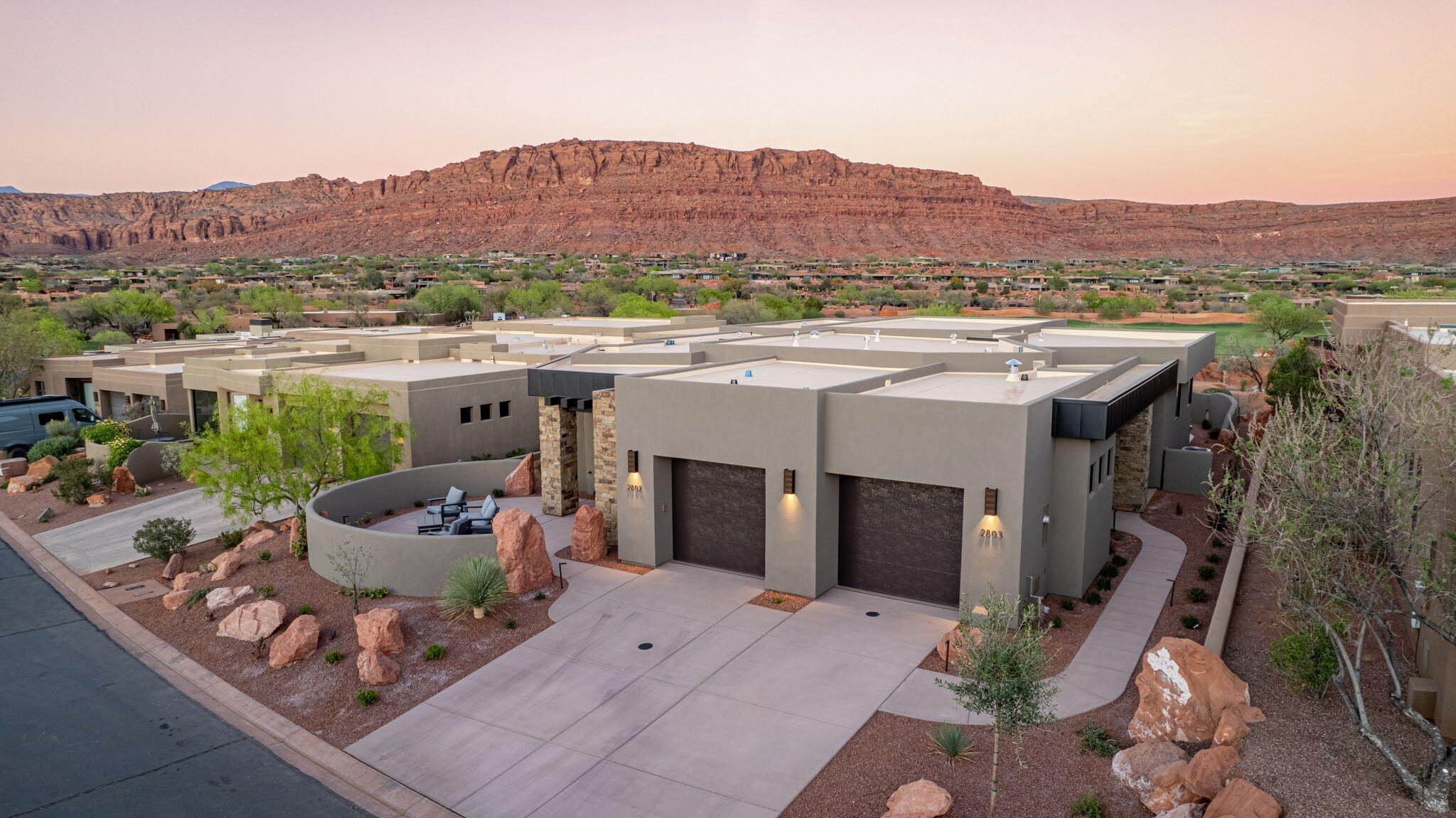 EQUITY GOLF MEMBERSHIP INCLUDED. Beautiful brand-new home located in the Shinava Ridge section of Inn at Entrada, this thoughtfully designed lock off duplex offers 2,660 sq ft of flexible living space, built in 2026 and perfectly suited for nightly rentals, second home use, or multi-generational living.

The property is configured as two separate living spaces: a 2 bedroom, 2.5 bath unit with full kitchen, open living area, and private patio, plus a 1 bedroom, 1.5 bath unit with full kitchen, private entrance, and its own outdoor space. Both sides can be used together or independently. 2 car attached garage with storage. Move-in ready.

Conveniently positioned within walking distance to the Entrada clubhouse and amenities. Enclosed front and back patios provide functional outdoor living with built-in BBQ and surrounding red rock and mountain views.

Community amenities include golf, fitness center, spa, indoor/outdoor pool, pickleball, tennis, dining, and gated security.

Strong rental potential with multiple management options including participation in the Inn at Entrada rental program, third-party management, or self-management.