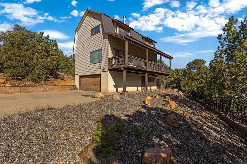 Your beautiful mountain cabin is ready. Enjoy the most beautiful views of Pine Valley Mountain in the morning, mid day, and evening sitting on the covered deck enjoying the cool weather during the hot summer months. Don't be surprised to see deer on your property. Built in 1988, owned by one family as a vacation property, 1,728 sqft, with 4 beds, 2 full baths and a half bath. Comes with an attached 2 car garage with a small workshop area in the garage. Comes with two lots each 0.45 acre in size totaling 0.90acre. Each lot has its own parcel number. Only 30 minutes from St. George and only 2 hours from Las Vegas. Make great memories with your family and friends. Enjoy a cabin getaway from the city life. Close to reservoirs for fishing, outdoor fun. Sold as is. Schedule your showing today!