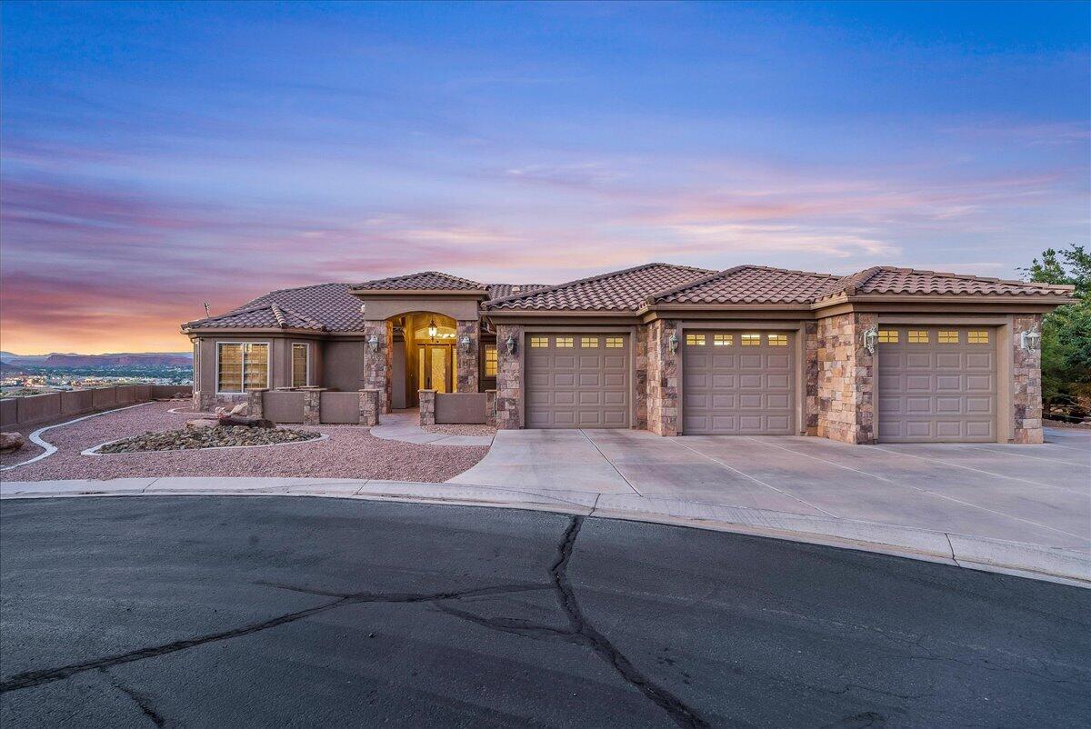 Experience luxury single-level living in this custom-built home, perfectly designed with a unique yet highly functional layout. Showcasing stunning finishes throughout and breathtaking views that are truly to die for, this residence offers the perfect blend of elegance and comfort. Enjoy seamless indoor-outdoor living with a spacious patio ideal for taking in the spectacular red rock scenery. Located within a desirable gated community, the property also features a full-size mother-in-law suite with complete living quarters, providing exceptional flexibility for guests, extended family, or multi-generational living. This one-of-a-kind home delivers privacy, beauty, and convenience in an unforgettable setting.