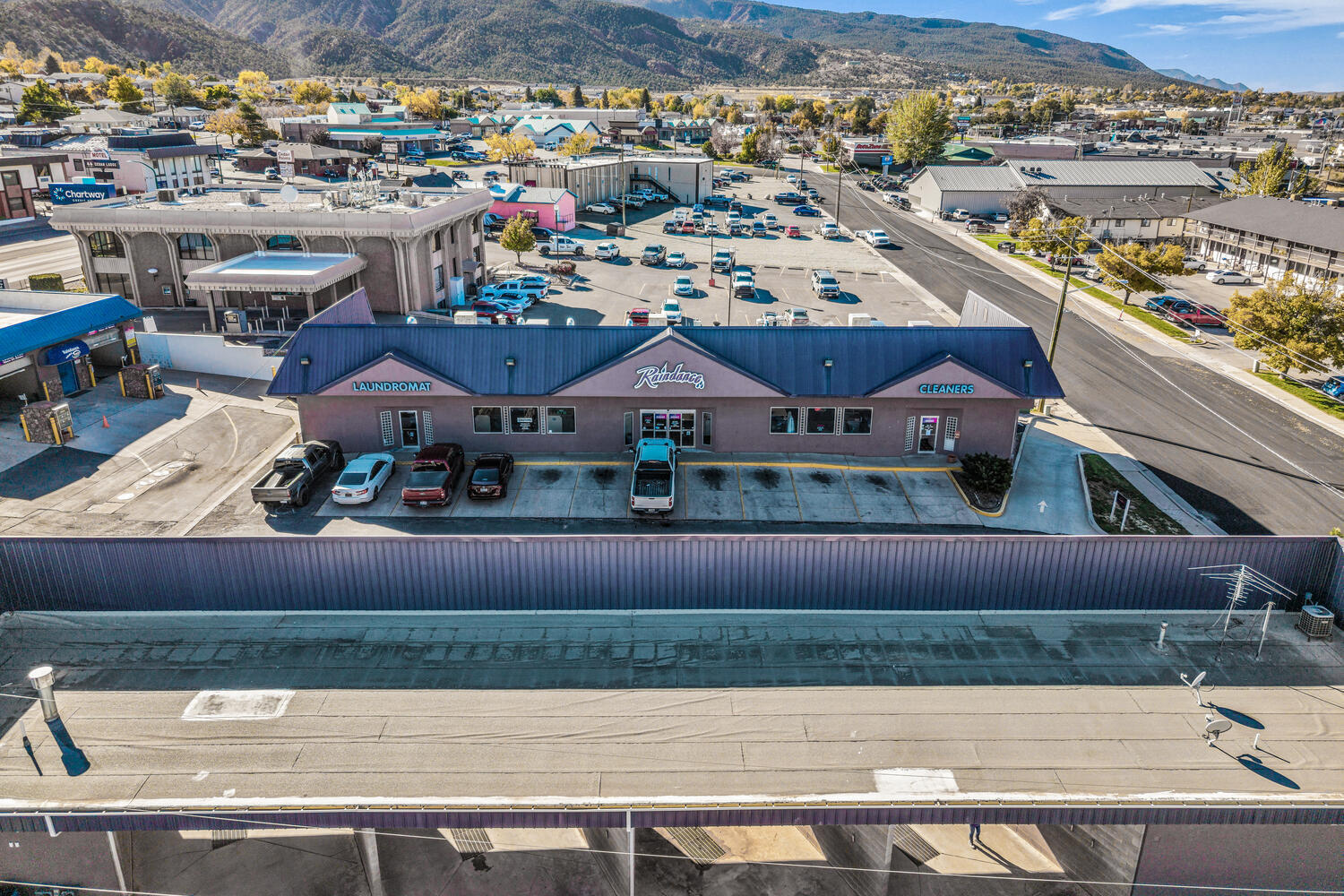 Laundromat and Dry Cleaning Business + Commercial Property opportunity in Downtown Cedar City! New Roof installed Dec 2025. Looking to invest or own your own business? Look no further than Raindance Laundromat & Dry Cleaners. Conveniently located on Main St in the heart of this booming Southern Utah community. With over 6,300 square feet of space, 3 phase power, & an established operation, the setup is ready to capitalize on. Features include equipment, easy access, great parking, & just blocks away from the Southern Utah University campus. Curious about the details, expansion opportunities, or have specific questions? Reach out to schedule a showing & start your journey to making this amazing opportunity yours.