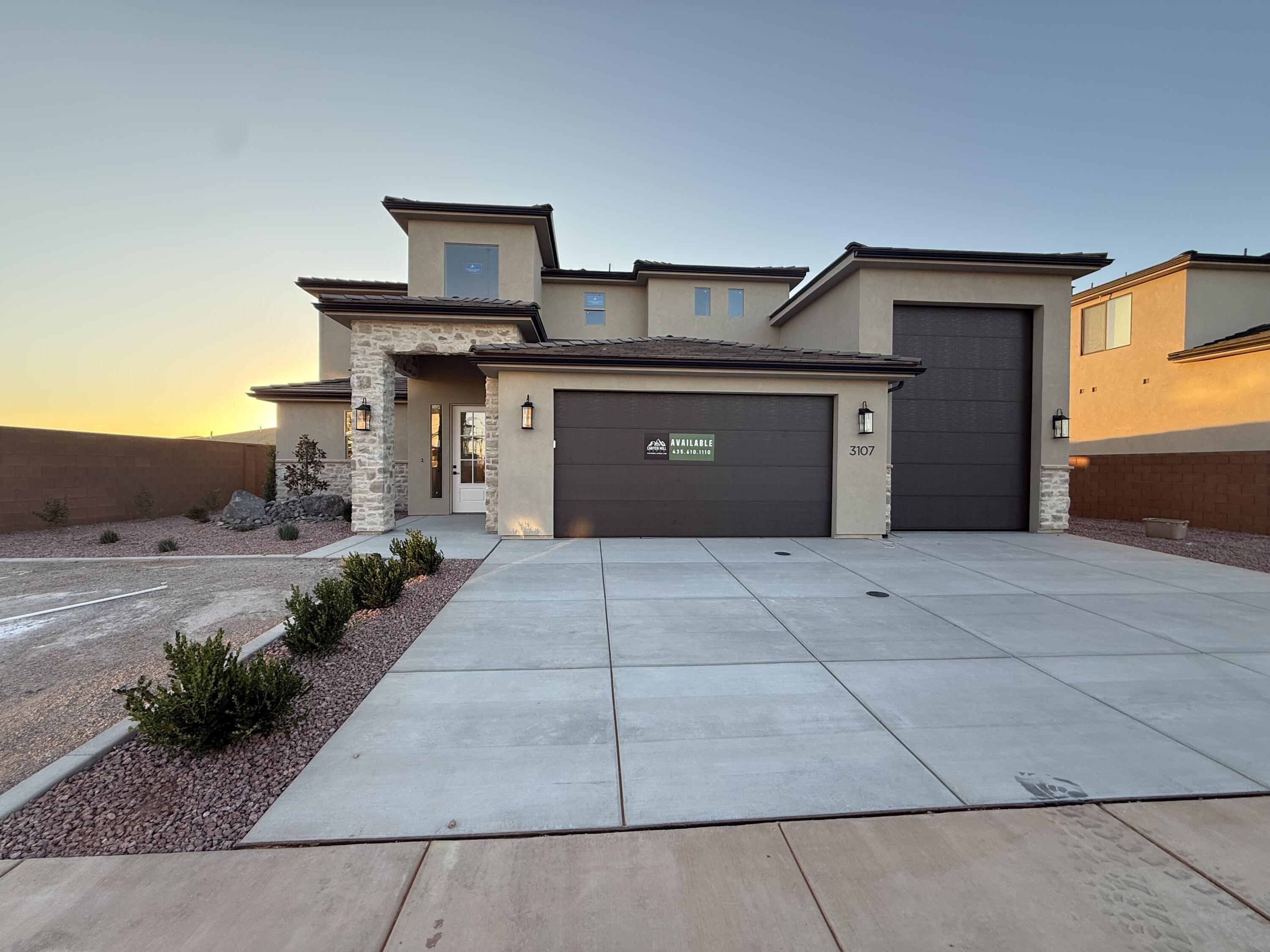 New Floorplan Alert!!! Welcome to your next home in Sand Hollow! This thoughtfully designed 2-story residence offers 2,744 SQFT of highly functional living space, perfect for both everyday comfort and entertaining. Featuring a highly sought-after RV garage, there's plenty of room for all your toys and storage needs.

Step inside to discover a gourmet kitchen with elevated finishes throughout, highlighted by a massive island that serves as the heart of the home--ideal for gatherings, meal prep, and making memories. The open-concept layout flows seamlessly to a large covered patio, creating the perfect indoor-outdoor living experience.

Upstairs, you'll find a spacious loft centrally located between the bedrooms, offering a versatile second living area, media space, or playroom. Every detail of this home has been designed with functionality and style in mind.

Enjoy unbeatable access to Southern Utah's outdoor lifestyle with Sand Hollow State Park just minutes away--offering boating, off-roading, hiking, and endless adventure right at your doorstep.

This is a home you won't want to miss!