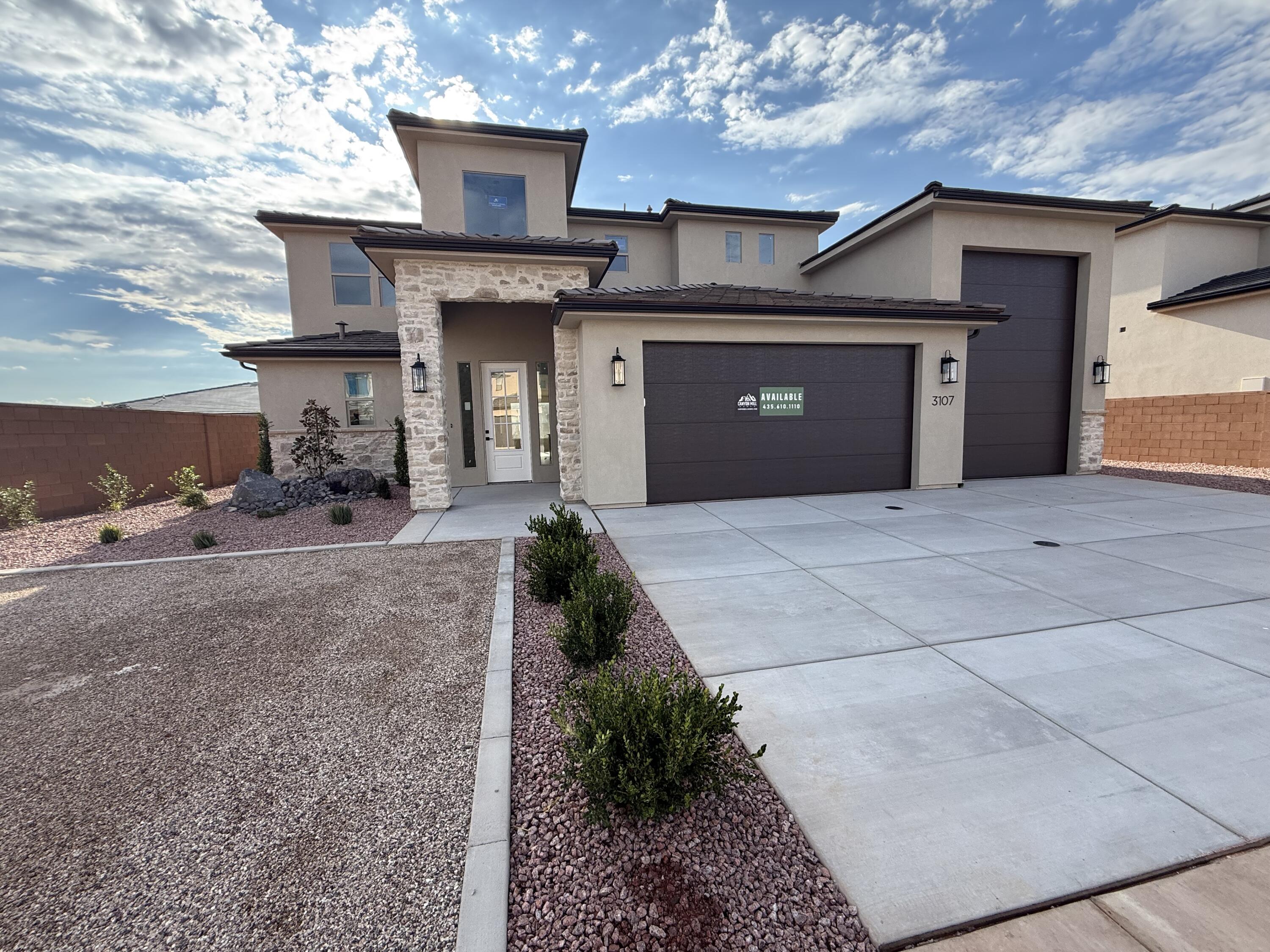 New Floorplan Alert!!! Welcome to your next home in Sand Hollow! This thoughtfully designed 2-story residence offers 2,744 SQFT of highly functional living space, perfect for both everyday comfort and entertaining. Featuring a highly sought-after RV garage, there's plenty of room for all your toys and storage needs.

Step inside to discover a gourmet kitchen with elevated finishes throughout, highlighted by a massive island that serves as the heart of the home--ideal for gatherings, meal prep, and making memories. The open-concept layout flows seamlessly to a large covered patio, creating the perfect indoor-outdoor living experience.

Upstairs, you'll find a spacious loft centrally located between the bedrooms, offering a versatile second living area, media space, or playroom. Every detail of this home has been designed with functionality and style in mind.

Enjoy unbeatable access to Southern Utah's outdoor lifestyle with Sand Hollow State Park just minutes away--offering boating, off-roading, hiking, and endless adventure right at your doorstep.

This is a home you won't want to miss!