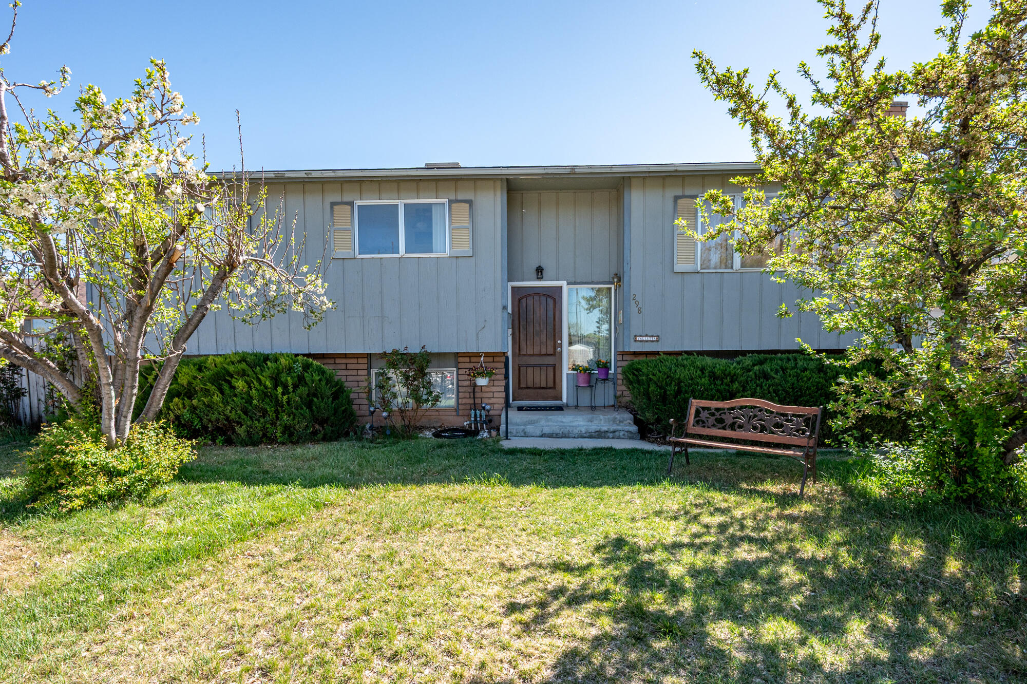Cute, quaint, and timeless! This updated 4 bed, 3 bath home features granite countertops, tile backsplash, a remodeled bath with walk-in shower, and a roof just 5 years old. The finished basement offers a spacious family room with wet bar, new carpet, and a bonus workshop or office area. Enjoy the fenced, landscaped backyard with a variety of fruit trees--plum, Italian prune, apricot, peach, apple, almond, and more. Centrally located within walking distance to SUU, schools, shopping, and everyday conveniences. A must-see opportunity! Property is zoned R3 for multifamily use.