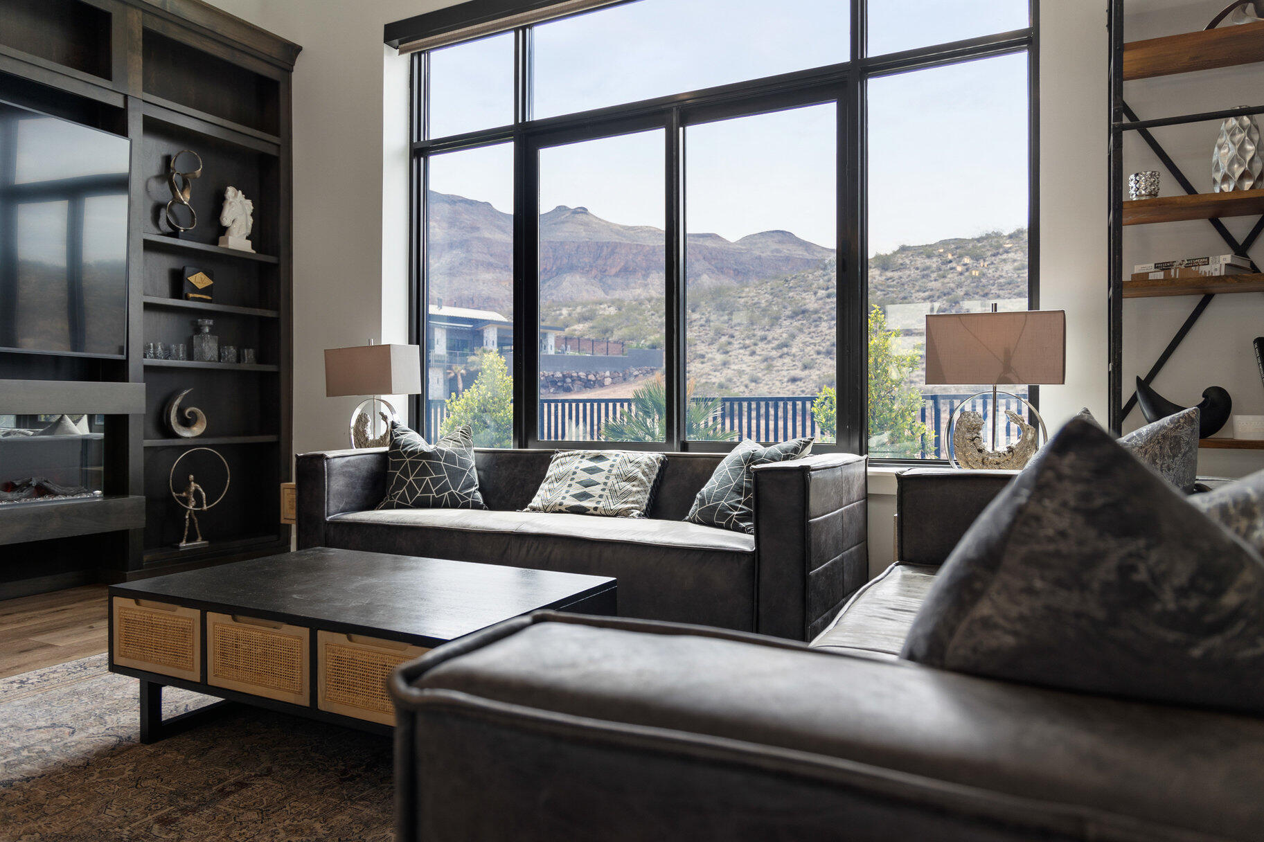 On the backdrop of the Copper Rock Championship Golf Course with stunning mountain views of the Hurricane Hills, Pine Valley, and the most stunning desert landscaping lies this modern-style short term rental home. Showcased as one of the homes in the 2022 Parade of Homes, this custom-built turnkey fully furnished stunner was designed for both aesthetic impact and practical living. Overall, the residence features 5 bedrooms, 5 bathrooms, 3 car garage (1,045 SqFt) with 14' ceilings and 10' bay door, over 50 solar panels with a power wall. The unique layout brings together a main residence and a guest house feel. The main house is 3 beds with 3 baths, and the detached guest house has 2 beds with 2 baths with a kitchen and living space. The main house includes a spacious great room that features 12' ceilings, large built-in entertainment center with a fireplace, tall windows, spectacular contemporary design light fixtures, large kitchen islands with Bianco Romano Granite countertop, Bertazzoni high-end Italian Appliances, two-tone cabinets, electronic blinds throughout, dedicated room-by-room mini split heating/cooling air conditioner units,  exquisite tile, LVP, and carpet throughout, and all of the most amazing upgrades. The exterior space is designed to entertain and absorb the beauty of the surrounding landscape with features like an inground pool with shamu shelf, built-in BBQ, artificial turf, pergola, upper view deck with a hot tub above the main house, additional upper deck above the guest house, and so many more details. Constructed with Insulated Concrete Forms (ICF), the home boasts an impressive R-54 insulation rating, contributing to low utility costs and increased rental profitability.
 
Situated on the foothills of the Hurricane Cliffs, just steps from the acclaimed Copper Rock Golf Course, this home enjoys a front-row seat to one of Southern Utah's finest championship courses. Copper Rock features 18 masterfully designed holes with sweeping desert views and has proudly hosted multiple LPGA and Epson Tour events, including the Copper Rock Championship. Adventure abounds beyond the fairwaysjust a short drive from the home, you'll find thousands of acres of red rock terrain, massive sand dunes, and ATV/OHV trail systems that connect to Sand Hollow Reservoir. The region is a haven for outdoor lovers with world-class mountain biking, hiking, and rock climbing. It's also home to major events, such as the Ironman World Championship, Red Bull Rampage, and more. Only a short drive away, explore the grandeur of Zion National Park, Bryce Canyon, the North Rim of the Grand Canyon, and nearby reservoirs like Quail Creek and Gunlock. Set at just over 3,000 feet above sea level where the Mojave Desert, Colorado Plateau, and Great Basin converge, this is truly one of the most striking and geologically unique regions in the country.
There's nothing else like itschedule your private showing today and experience a home that truly captures the soul of Southern Utah.((All information herein is deemed reliable but is not guaranteed. The buyer is responsible to verify all listing information, including square feet/acreage, to the buyer's own satisfaction.