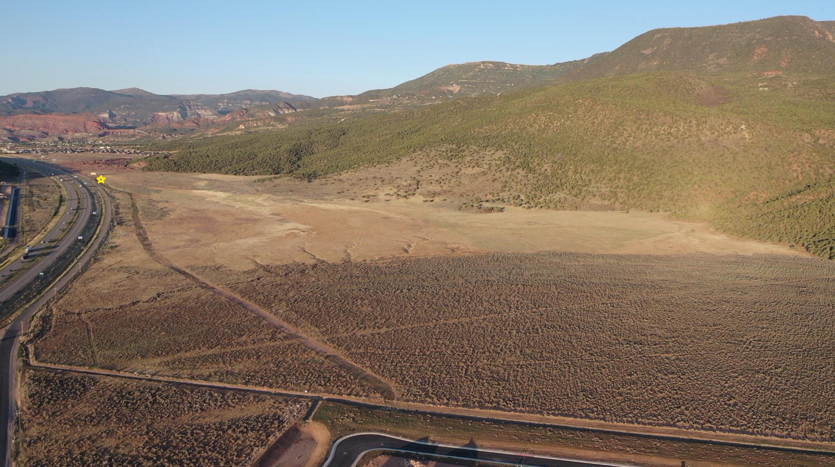 18.88 Commercial Acres right off of HWY 91 close to the South Interchange. So much potential for businesses in this up and coming area. Call for all the details.