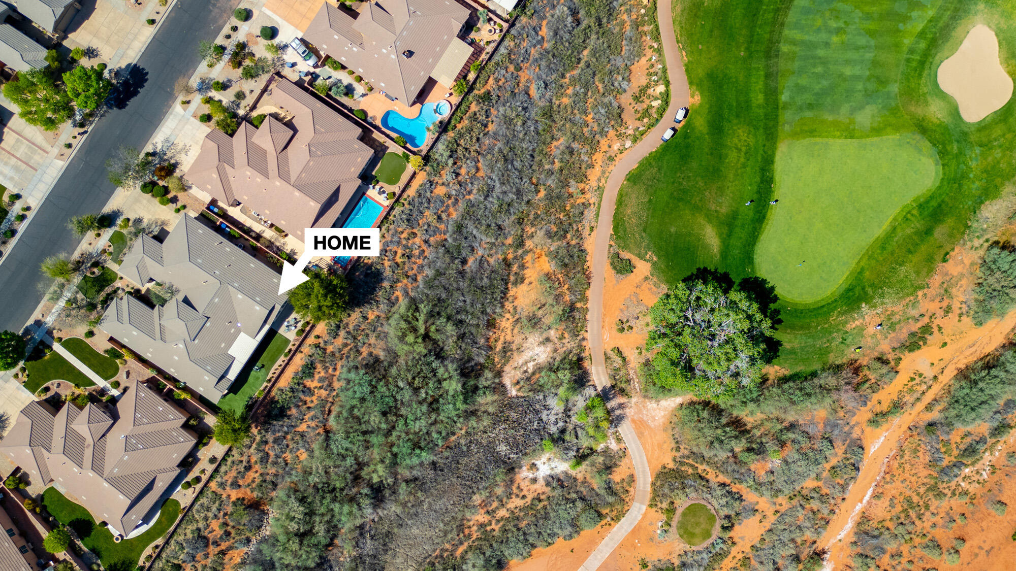 Beautiful one-owner home on the Coral Canyon Golf Course with stunning views! INTERIOR HAS BEEN COMPLETELY REPAINTED - Designed for entertaining, this property features a private 2-room casita / ADU with Wilding Wallbed and separate entrance, a backyard putting green, and a large covered patio with adjustable louvered shade. Spacious primary suite with jetted tub and separate shower, plus generously sized guest rooms with walk-in closets. Tile flooring and custom plantation shutters throughout. Well-appointed kitchen with oversized refrigerator, walk-in pantry, and butler's pantry connecting to the formal dining room. All appliances included.