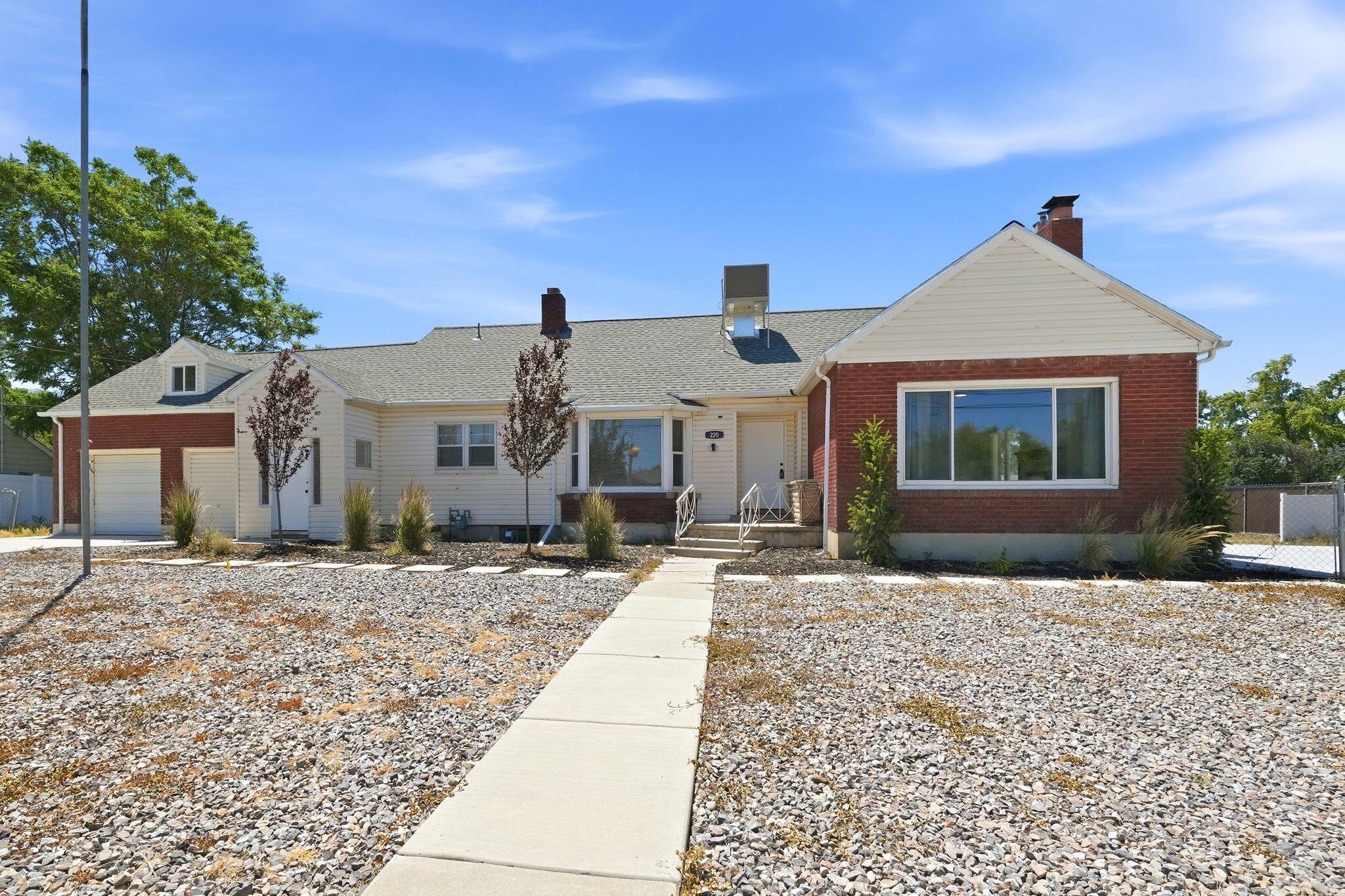 Updated home in a prime east-side location with convenient access to I-15 and Highway 201. This spacious property blends classic charm with modern updates, featuring a new roof installed in 2022, LVP flooring, and a beautifully remodeled kitchen with modern finishes. Multiple living areas provide exceptional flexibility, including a bonus room above the garage perfect for a home office, playroom, gym, or additional living space. The basement offers a second kitchen, family room and separate entrance, creating an ideal setup for multi-generational living, guests, or potential rental opportunities. Outside, enjoy low-maintenance landscaping and inviting outdoor spaces that make this home as functional as it is welcoming. A rare opportunity to own a versatile, move-in-ready home in a highly accessible location.