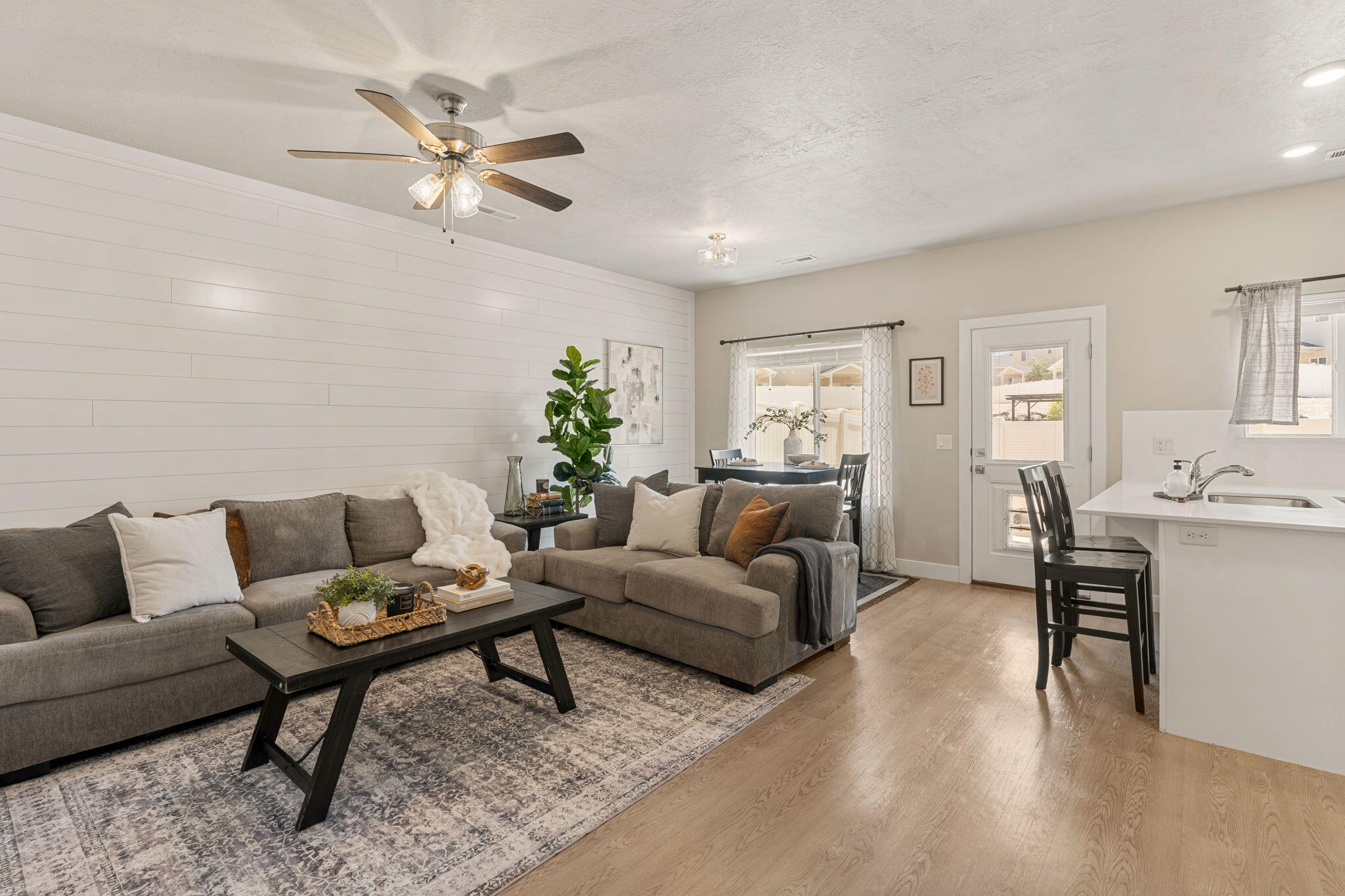 Welcome to this darling 3-bedroom townhouse in the desirable Cedar Bend Townhouse Community in Cedar City! Built in 2021, this move-in-ready home offers modern finishes, an open-concept layout, and low-maintenance living. Conveniently located near the North Interchange with easy access to I-15, shopping, restaurants, parks, and schools. The bright living space flows into a stylish kitchen and dining area, perfect for everyday living or entertaining. The spacious primary suite and two additional bedrooms offer flexibility for family, guests, or a home office. Perfect for first-time home buyers, investors, or anyone looking for comfortable and convenient living in a great location.
