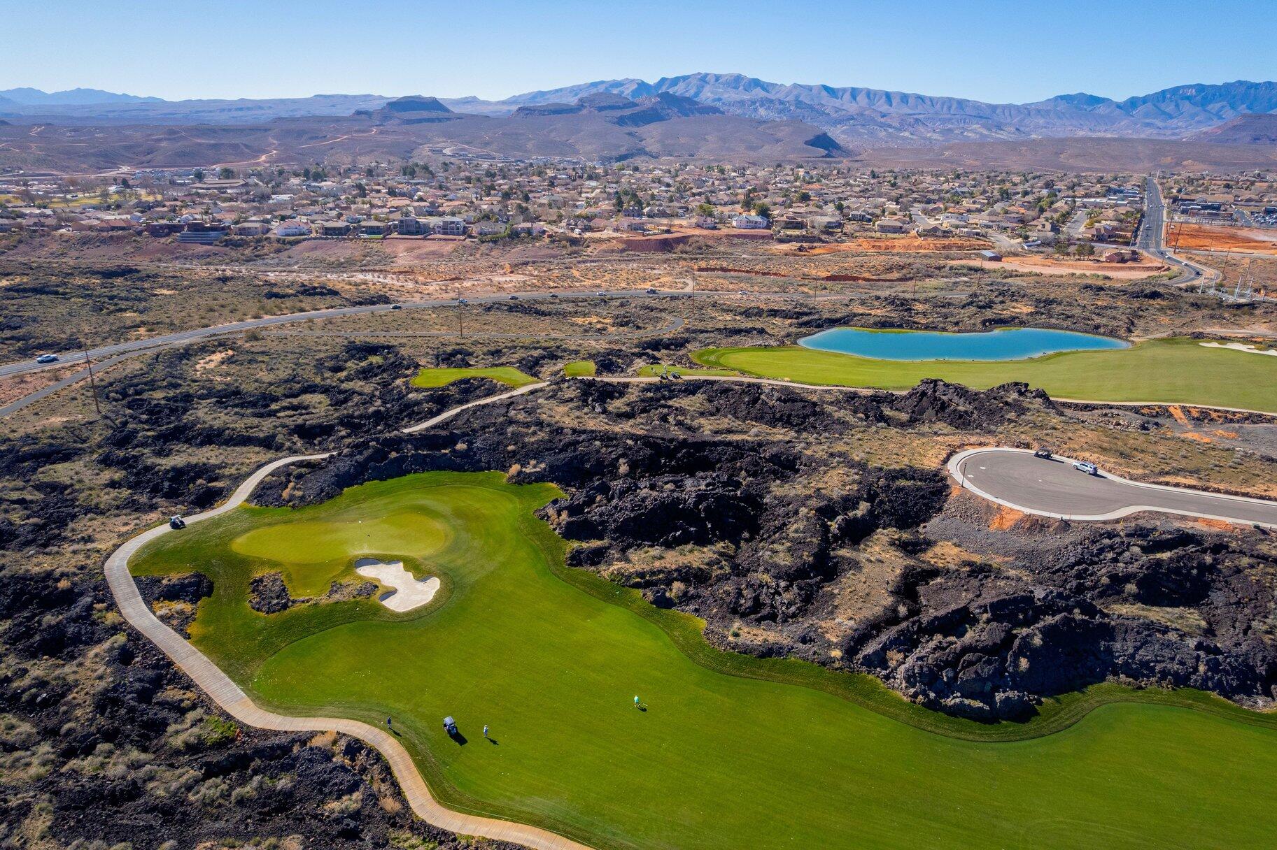 This exceptional 1.78-acre golf course lot at Black Desert Resort, backing to both the 5th and 6th fairways. This rare, oversized homesite offers an elevated and expansive golf course view, added privacy, and a stunning resort backdrop. With generous space to design a custom luxury residence, the lot captures the beauty of manicured fairways set against Black Desert's iconic lava rock and desert scenery. Enjoy a prime location within the resort, close to world-class amenities, championship golf, dining, and outdoor recreation. A rare opportunity to own a premier double-fairway lot in one of Southern Utah's most prestigious resort communities.