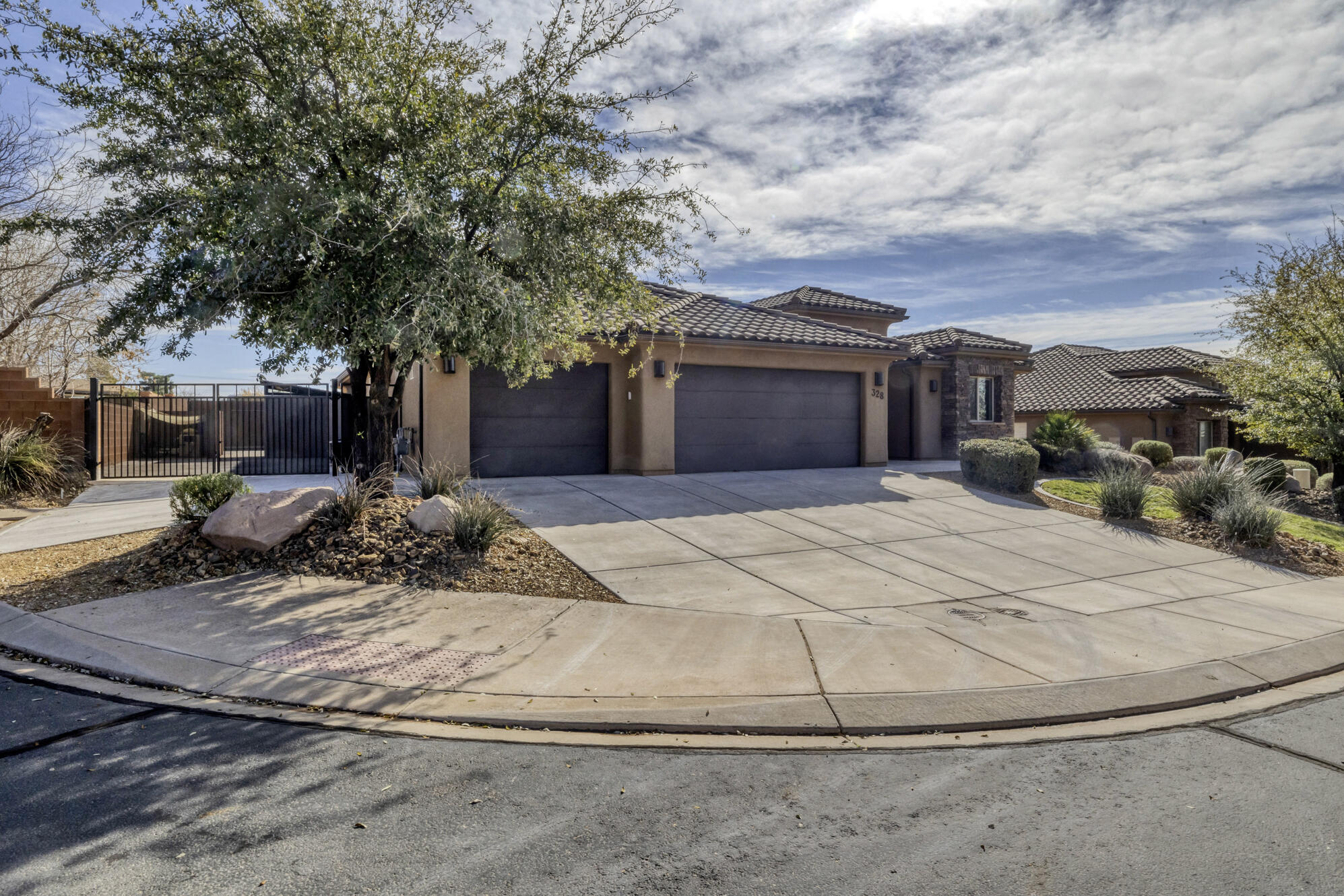 Home with Awesome inground, heated saltwater pool, near Snow Canyon State Park and views of the Red Mountain! Get ready for the summer in your new Home. The home has been totally updated and features 4 large bedrooms, 2 full baths plus one-half bath, has split floor plan with open concept, chef's kitchen with stainless appliances, quartz counters, engineered hardwood floors in living areas and tile floors in bathrooms and laundry room. The backyard is an oasis waiting for its new owners with a large inground salt water/ heated pool and large East facing backyard with gorgeous views for entertaining family and friends! Other features of the home are fully fenced yard, professionally landscaped auto sprinklers and a 3-stall garage. Call to schedule your own private showing today. Square footage figures are provided as a courtesy estimate only and were obtained from county records. Buyer is advised to obtain an independent measurement.
